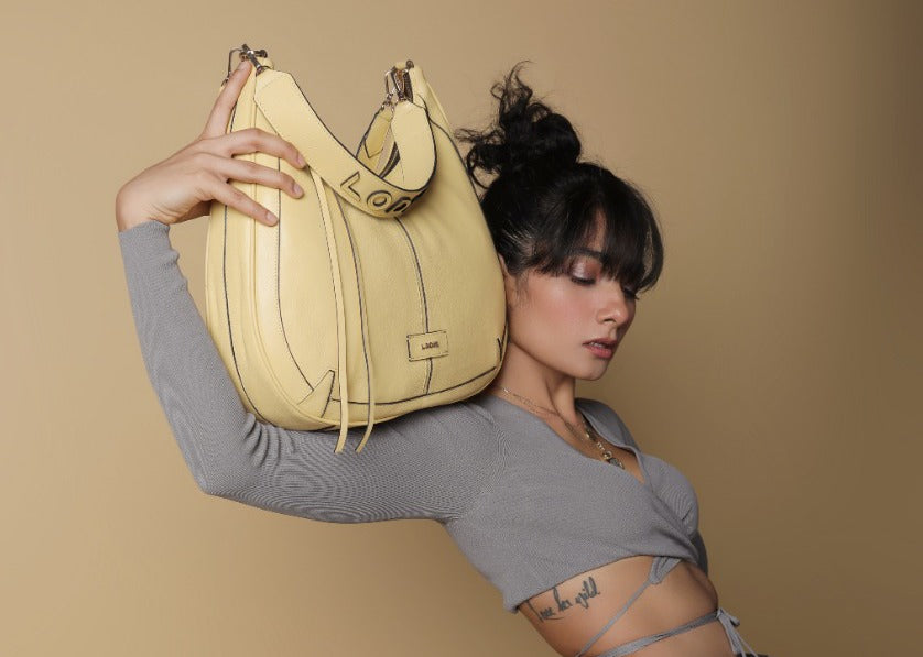 Stay organized in style with our Sienna Hobo Bag. With its soft leathe
