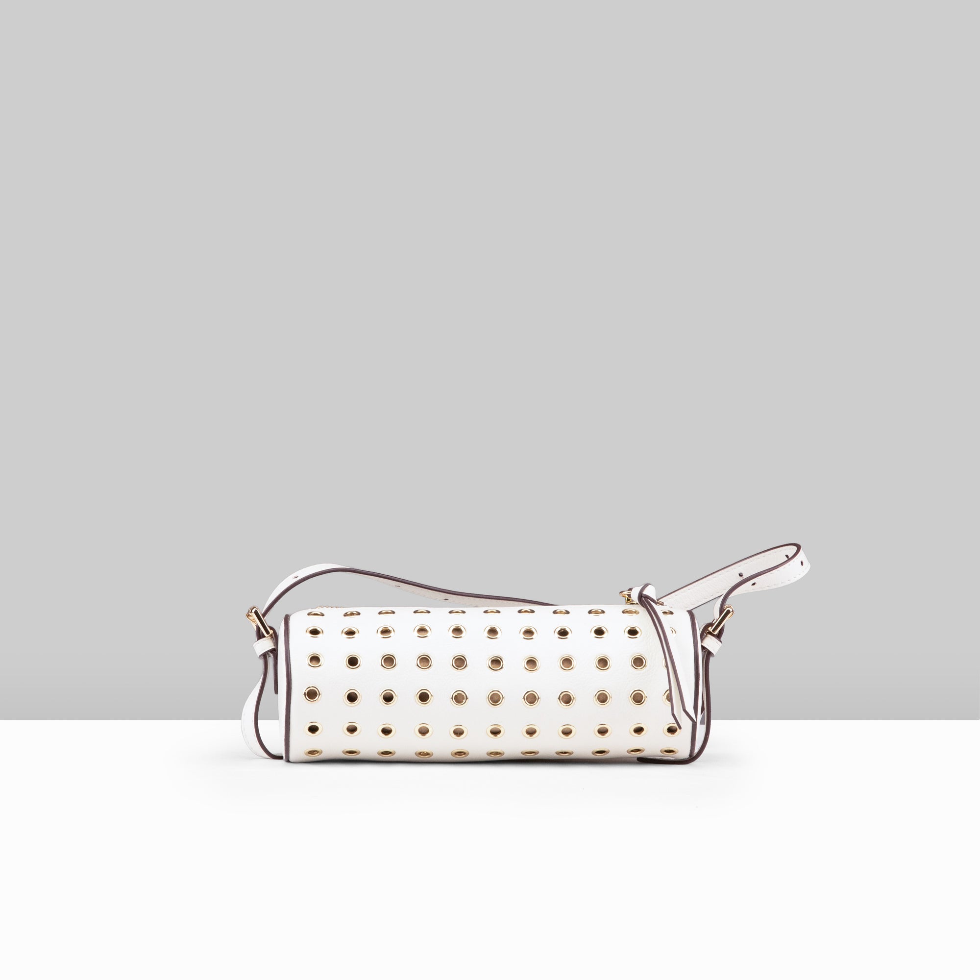 Stephanie Barrel Bag in White Leather – Front View with All-Over Gold Eyelet Studs and Detachable Crossbody Strap | Lodis 1965