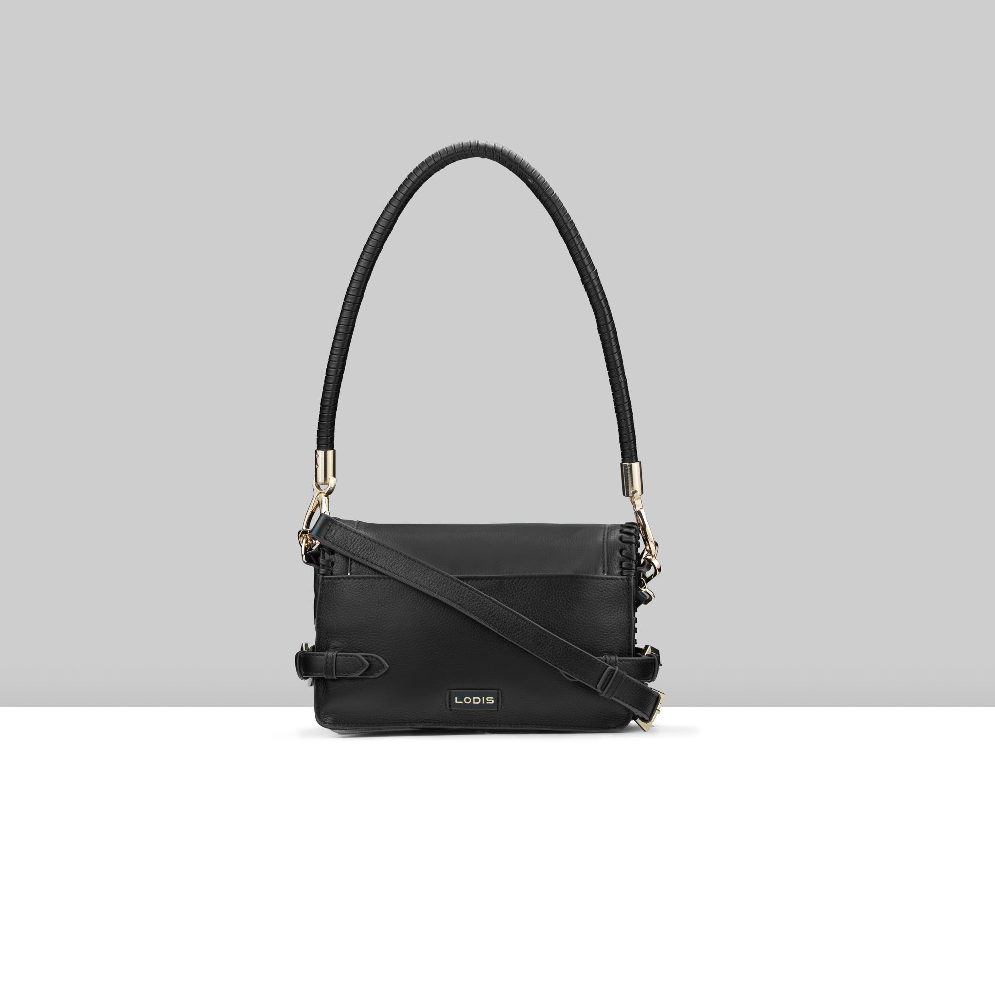 Lodis Elina EW Crossbody black glazed leather bag showing back view with Lodis logo, whipstitch trim, and adjustable crossbody strap