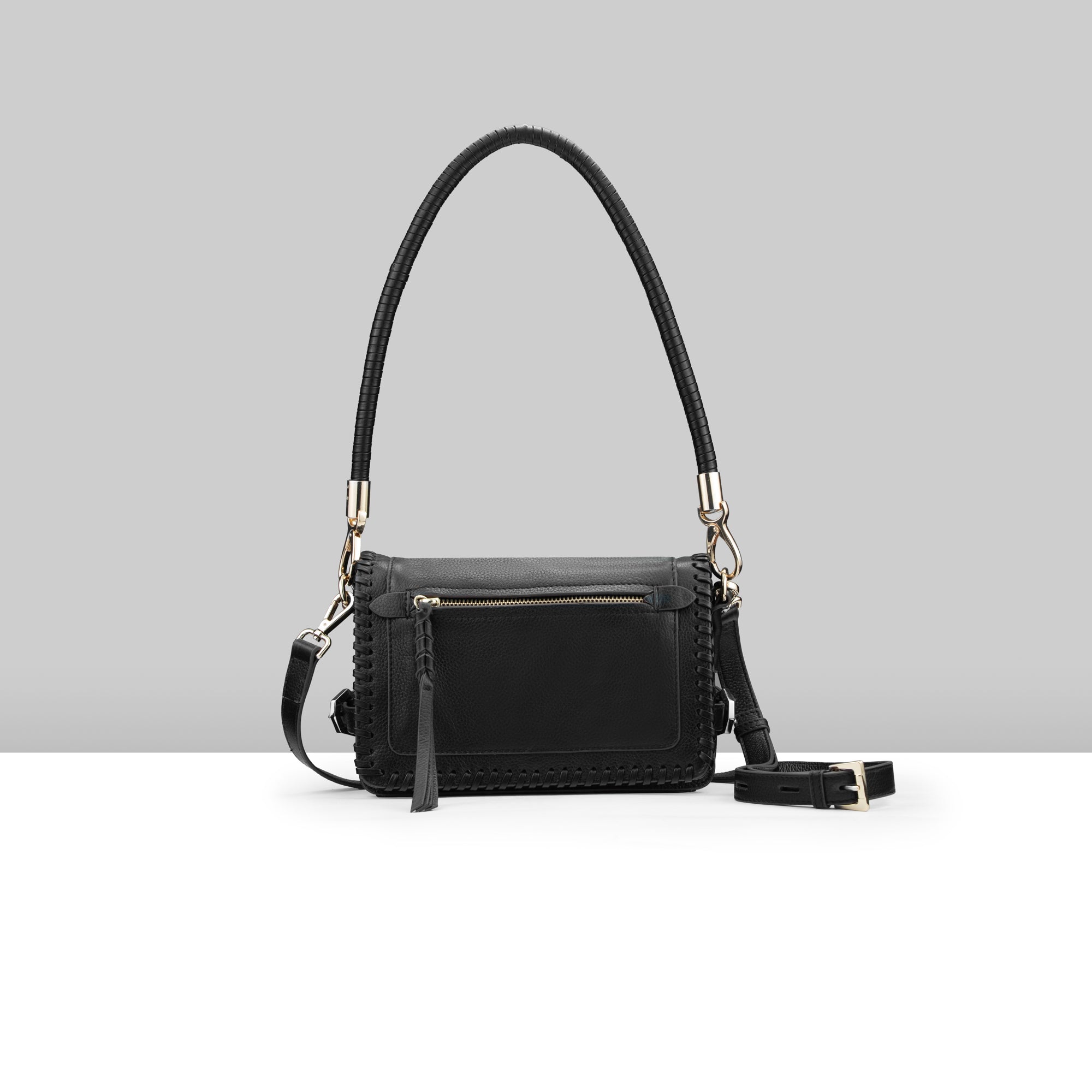 Lodis Elina EW Crossbody black glazed leather handbag with whipstitch detail, front zip pocket, braided top handle, and gold hardware