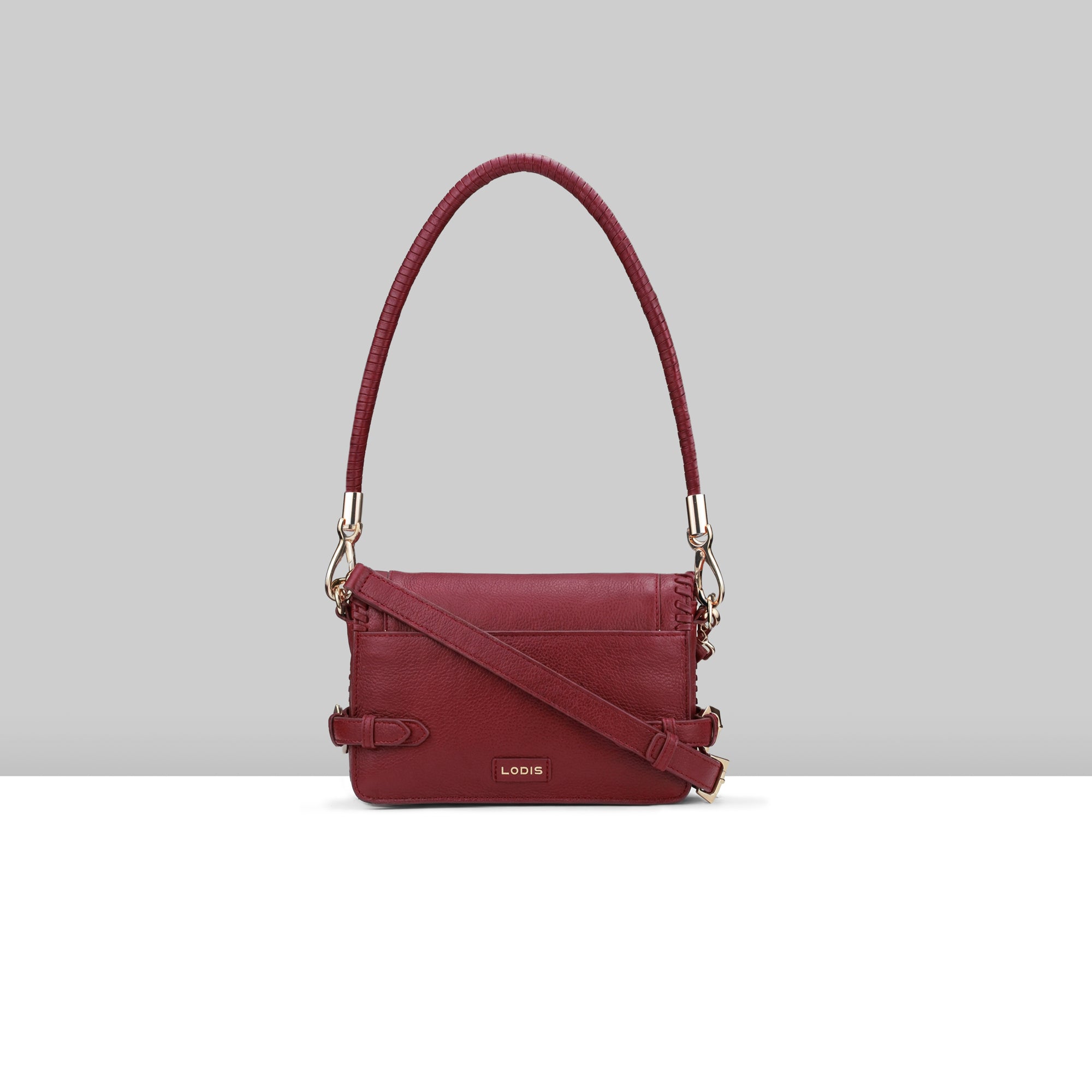 Lodis Elina EW Crossbody wine glazed leather bag showing back view with Lodis logo, whipstitch trim, and adjustable crossbody strap