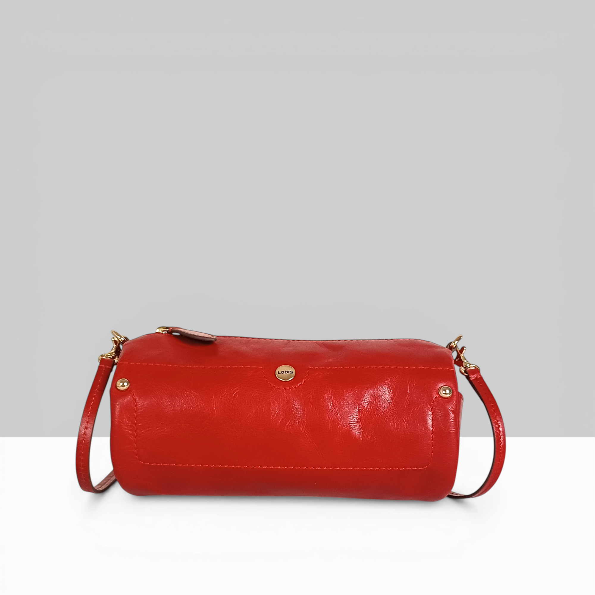 Lodis Overglow Barrel Sling Bag in Red Glossy Patent Leather – Bold Statement Crossbody