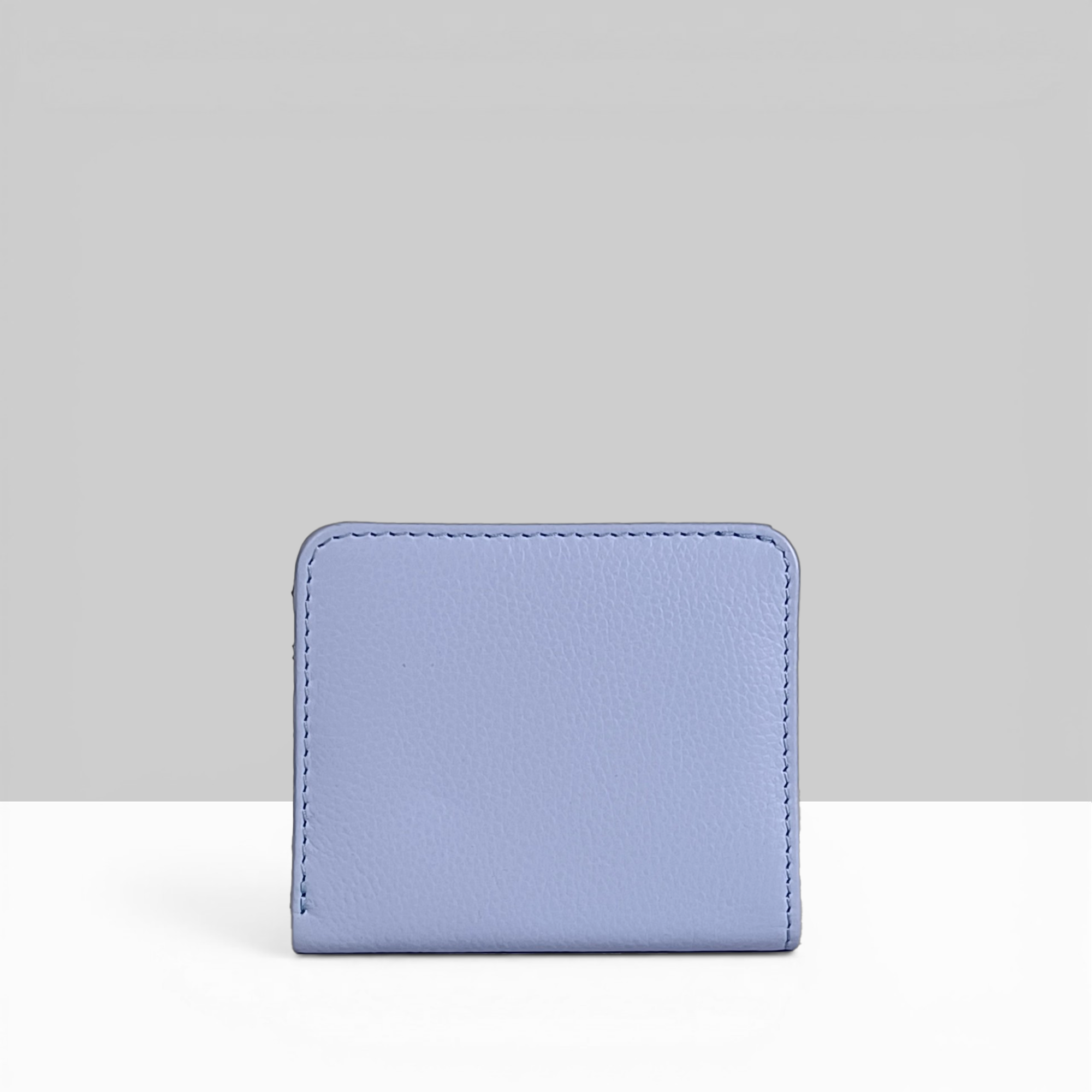 Lodis Kiara Envelope Card Wallet in aura lavender pebbled leather showing back view with clean minimal design