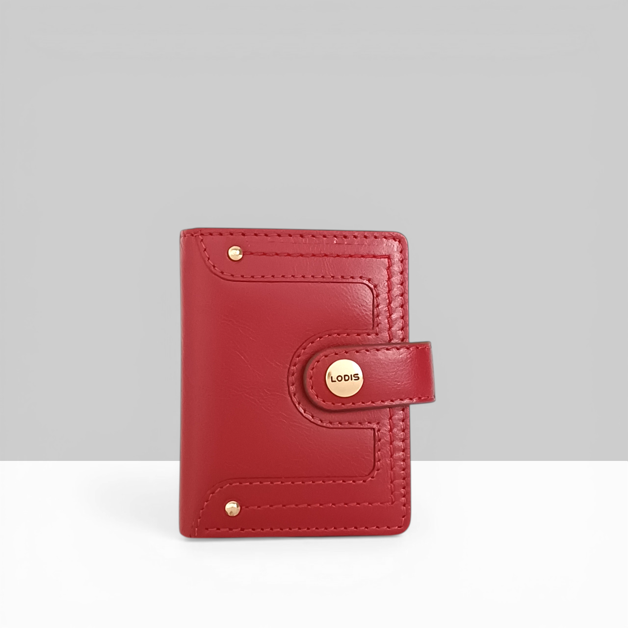 Lodis Overglow Slim Wallet in Rhythmic Red Leather with Gold Snap Button Closure