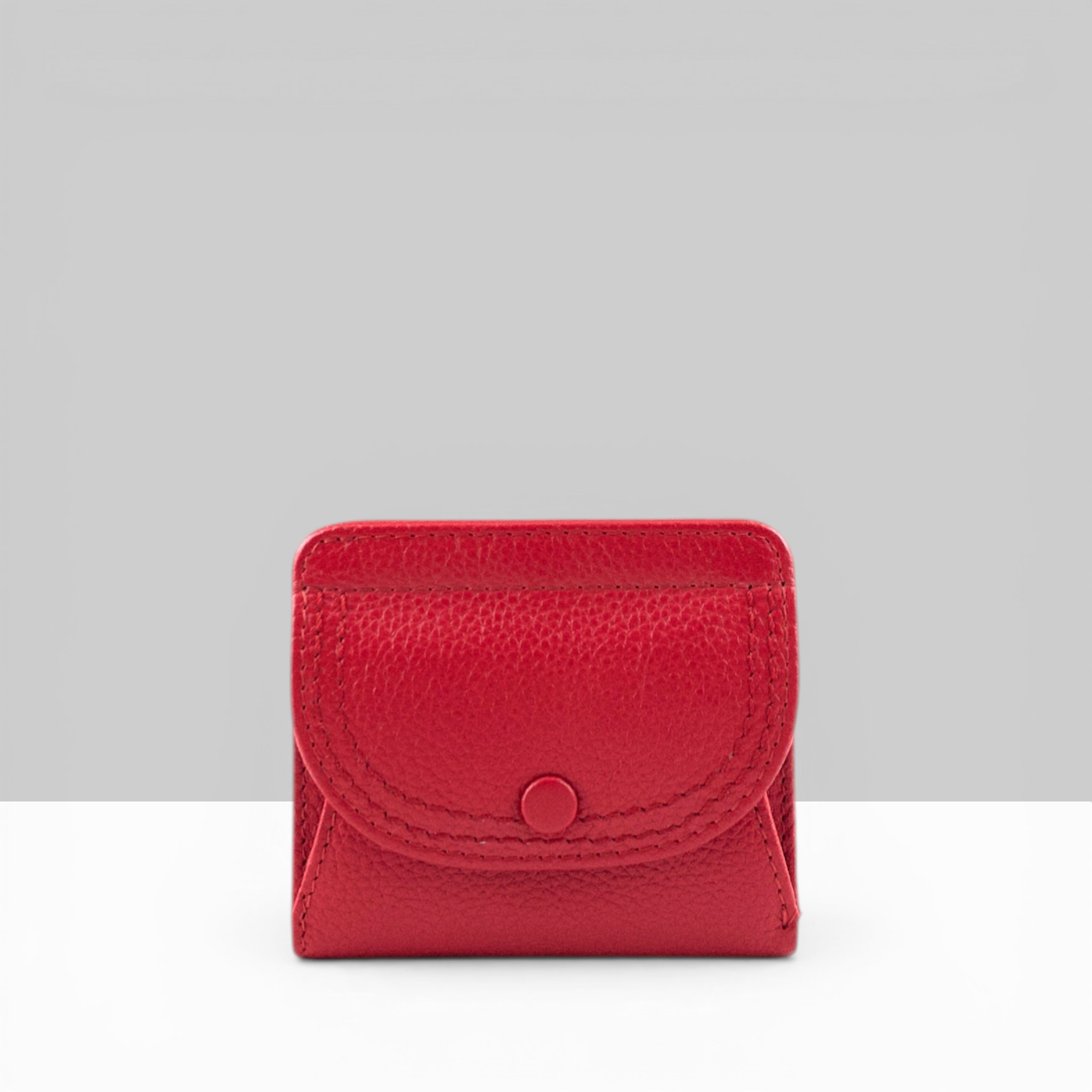 Lodis Kiara Envelope Card Wallet in rhythmic red pebbled leather with snap closure β front view