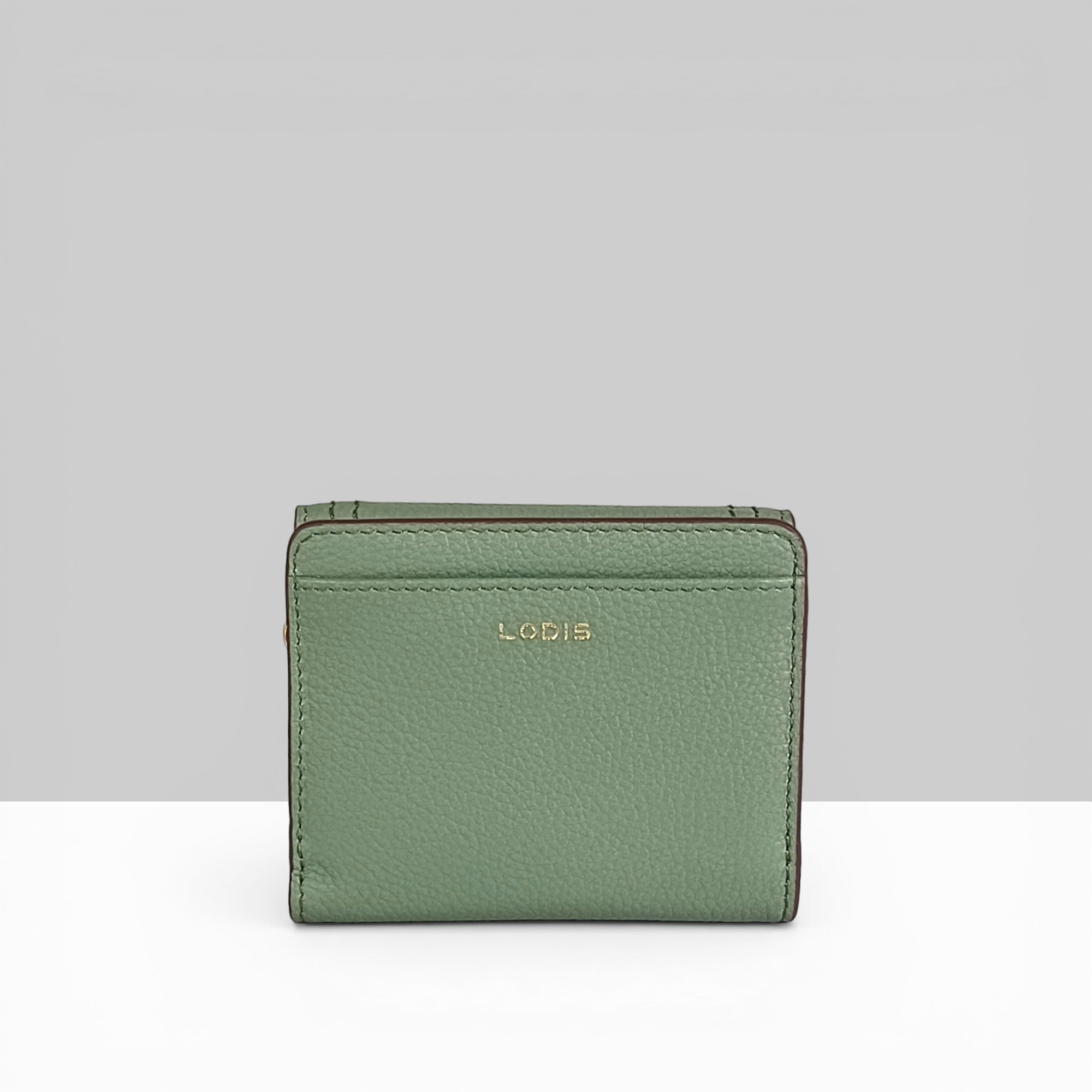 Lodis Kiara French Purse in sage green pebbled leather showing back view with embossed Lodis logo
