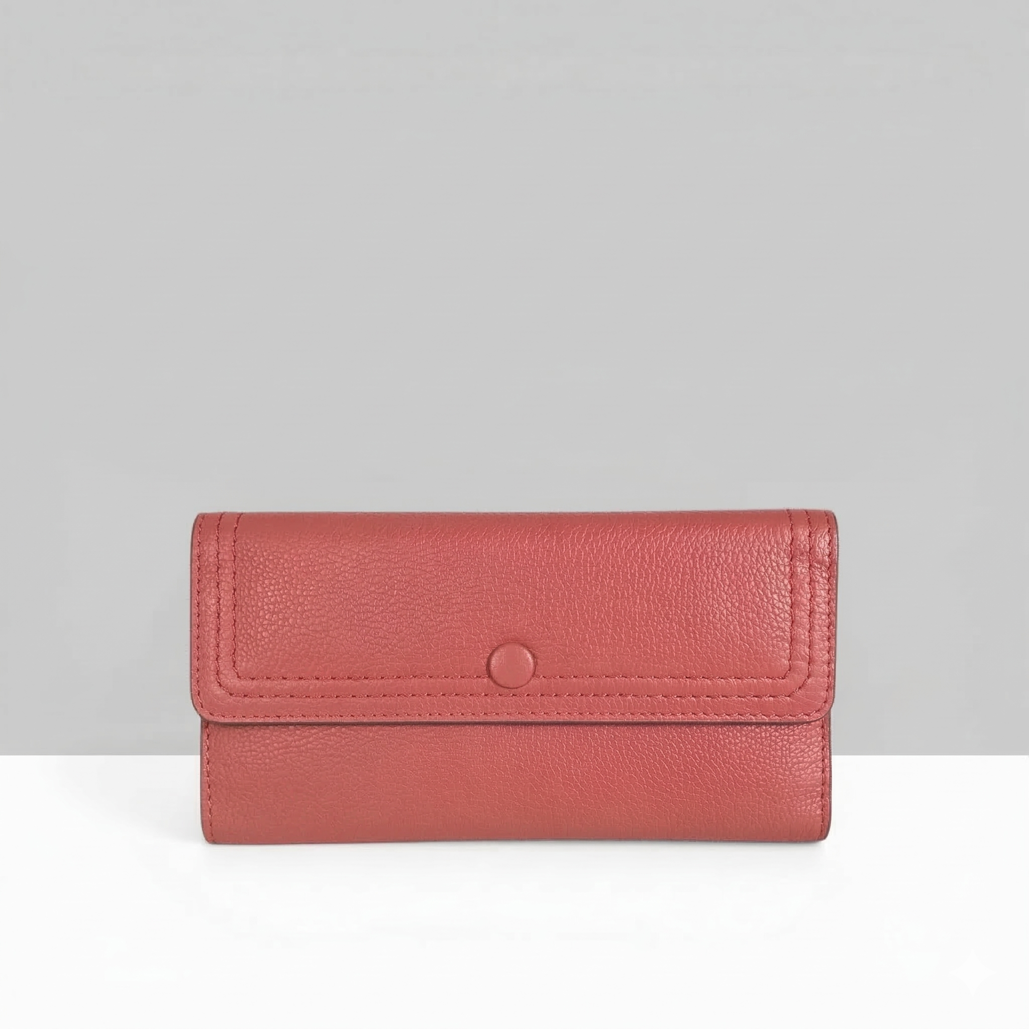 Lodis Kiara Large Flap Wallet in rhythmic red pebbled leather with snap closure – front view