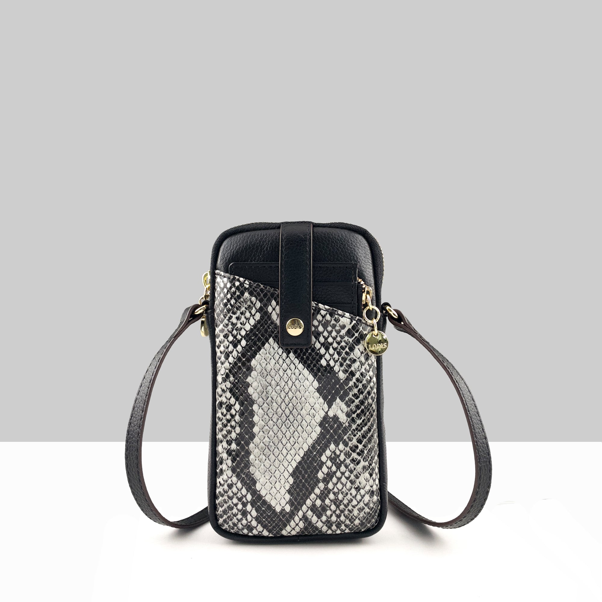 Lodis Catalina City Sling black and white snaeskin print leather crossbody phone bag with snap closure and gold hardware