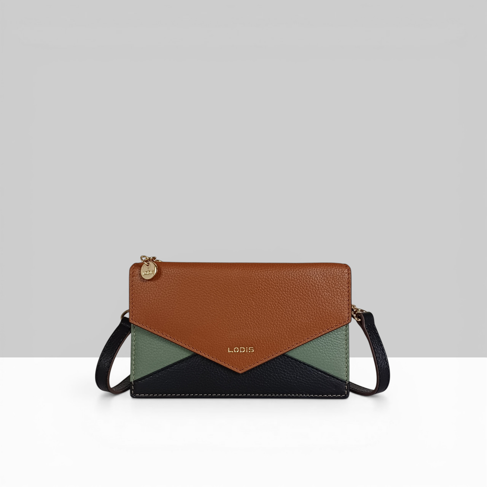 Lodis Vista Envelope Pouch Sling – Adjustable Shoulder Strap Detail in Cognac Brown Leather