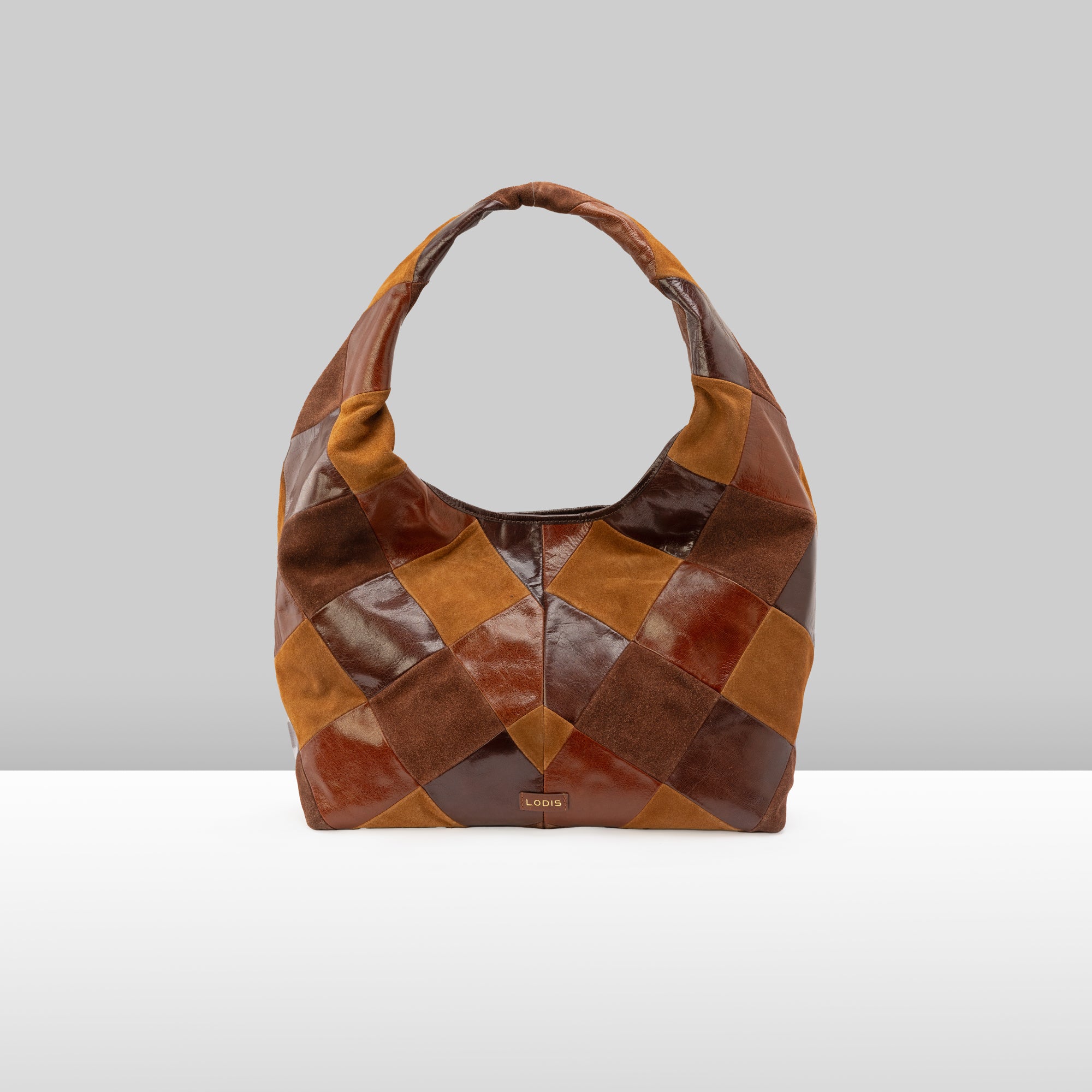 Piece Train Hobo in Chestnut Multi Suede Leather – Front View Showing Lodis Logo Stamp and Mixed Suede and Leather Patchwork Detail | Lodis 1965
