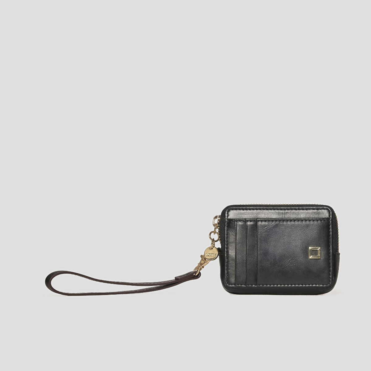 Lodis Blair Trouble Card Case in Black - Front View with Wristlet Strap Fully Extended, Black Glazed Leather with Zip-Around Closure, Gold-Tone Logo Plate and Coin Charm | Lodis 1965