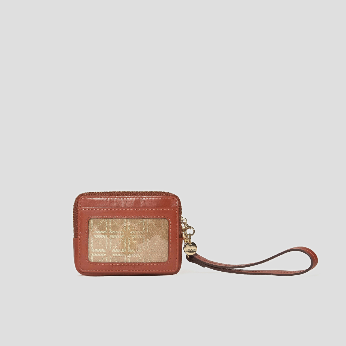 Lodis Blair Trouble Card Case in Rust - Back View Showing Exterior Clear ID Window with Lodis Monogram Insert, Glazed Leather Trim and Wristlet Strap | Lodis 1965