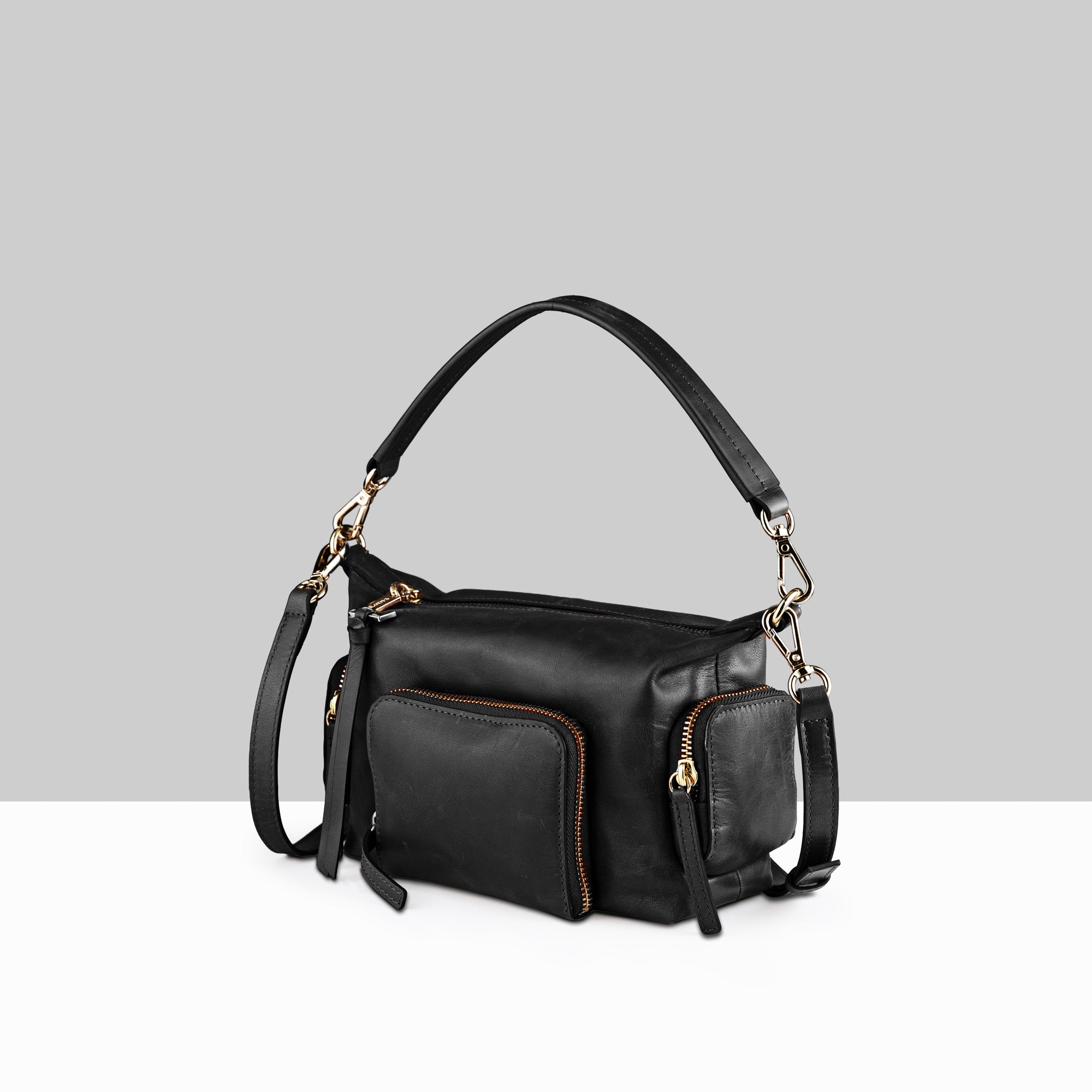 Lodis Jill TH Crossbody in Black – Side Profile View, Polished Genuine Leather with Front Zip Pocket and Gold-Tone Hardware | Lodis 1965