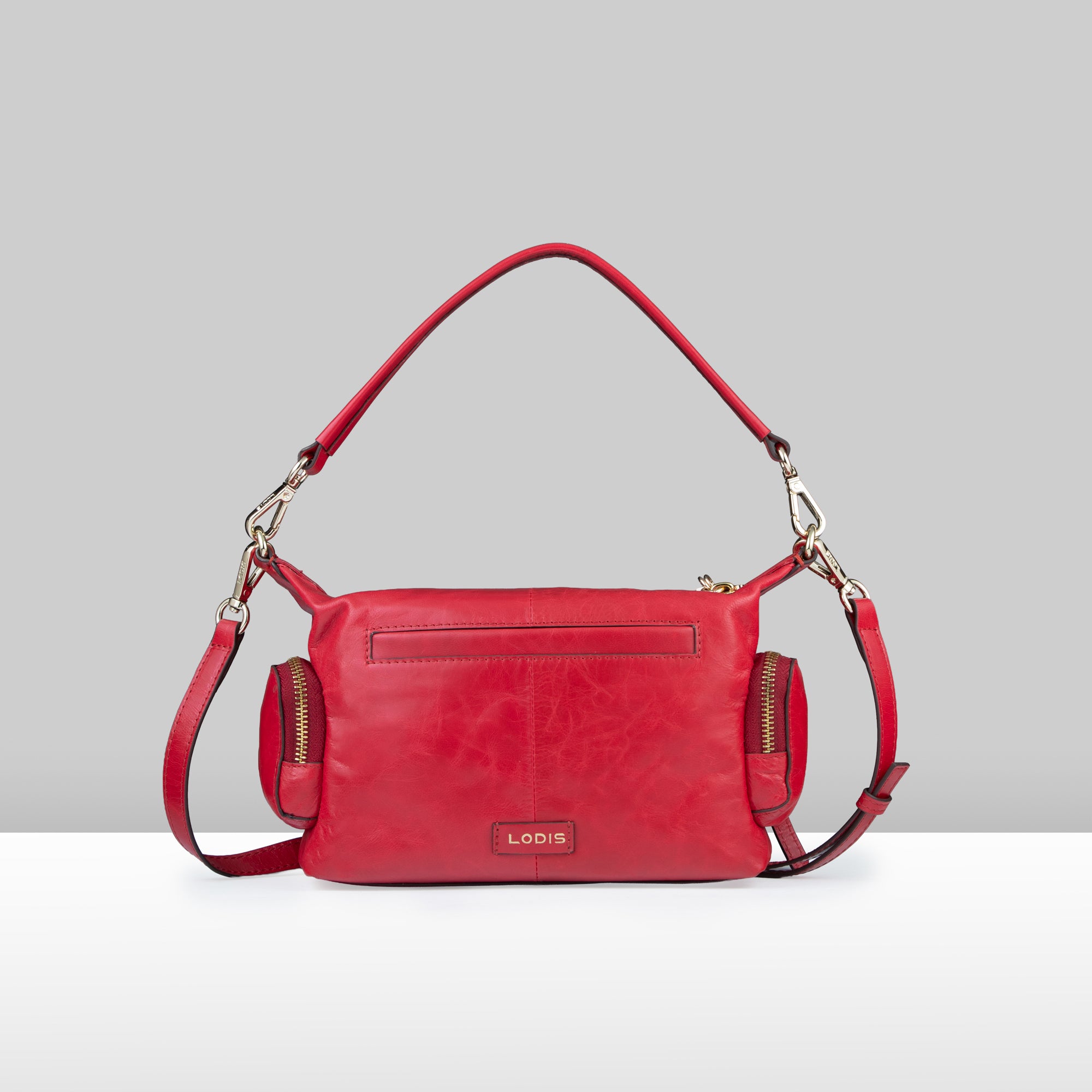 Lodis Jill TH Crossbody in Rhythmic Red – Back View, Polished Genuine Leather with Lodis Logo Plate and Adjustable Crossbody Strap | Lodis 1965