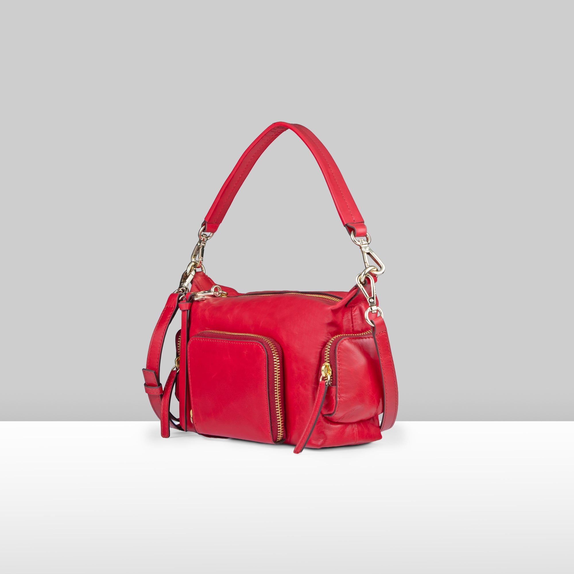 Lodis Jill TH Crossbody in Rhythmic Red – Side Profile View, Polished Genuine Leather with Side Zip Pocket and Gold-Tone Hardware | Lodis 1965