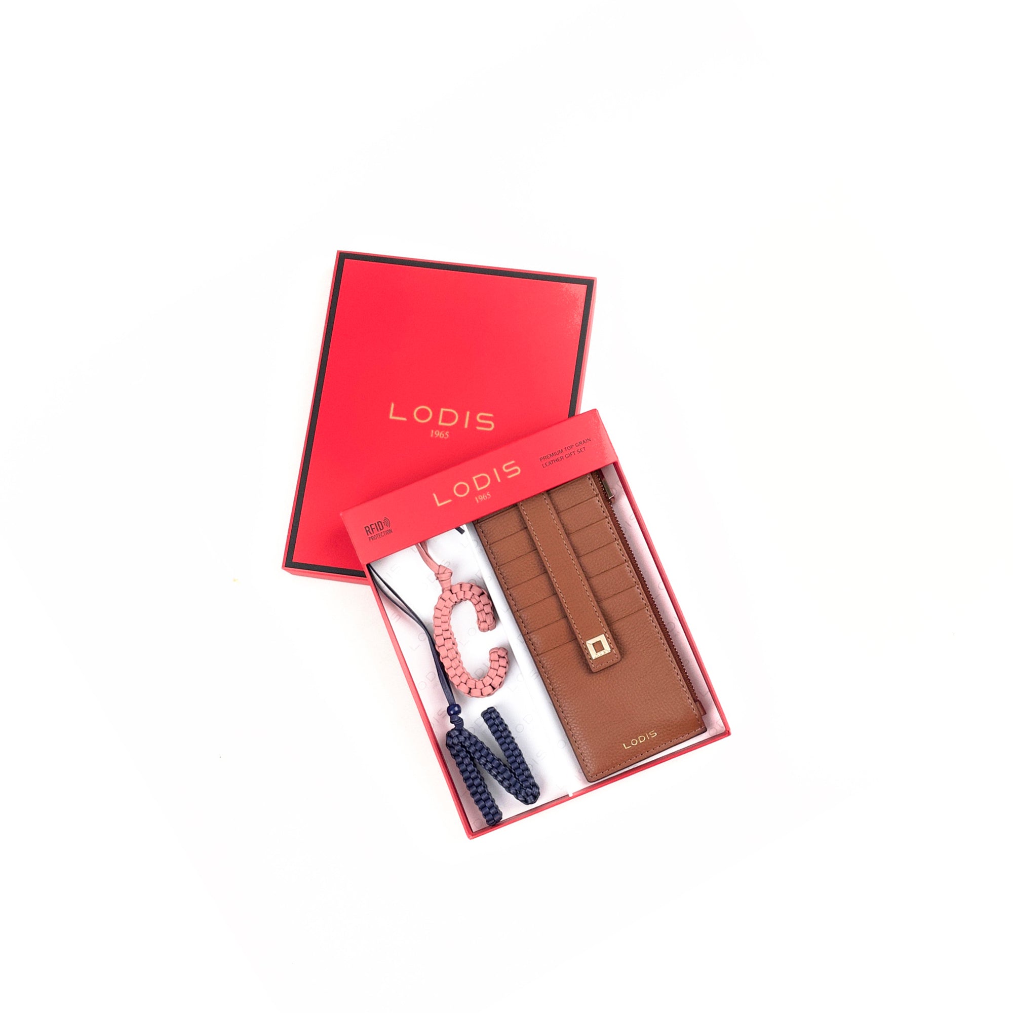 Lodis Personalized Julia Card Case Gift Set in Chestnut – Close-Up of Open Gift Box Showing Tan Leather Card Case, RFID Protection, and Beaded Initial Charms | Lodis 1965