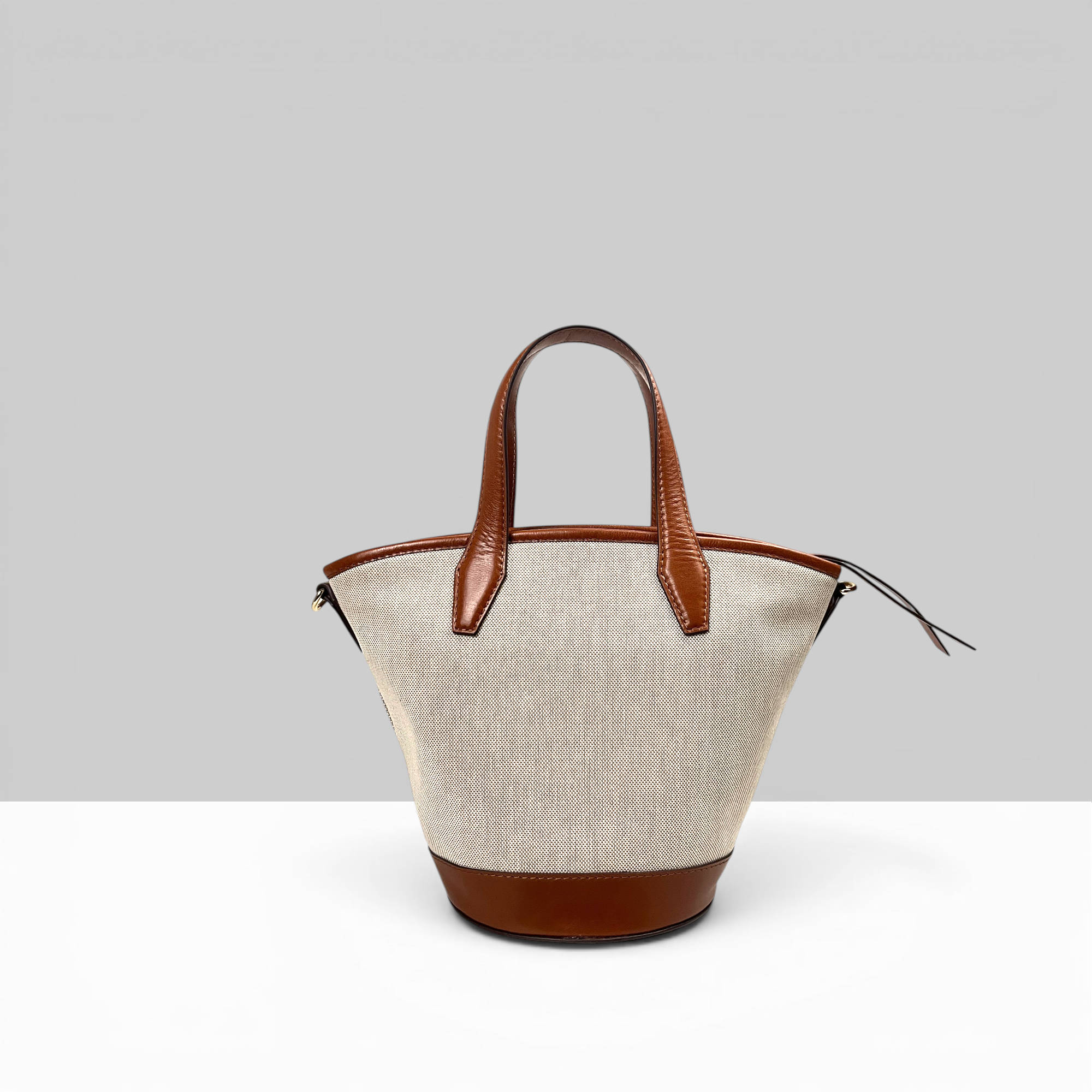 Lodis Kiara Small Bucket Bag in Chestnut – Back View Showing Rounded Bucket Silhouette, Chestnut Leather Base and Drawstring Closure | Lodis 1965