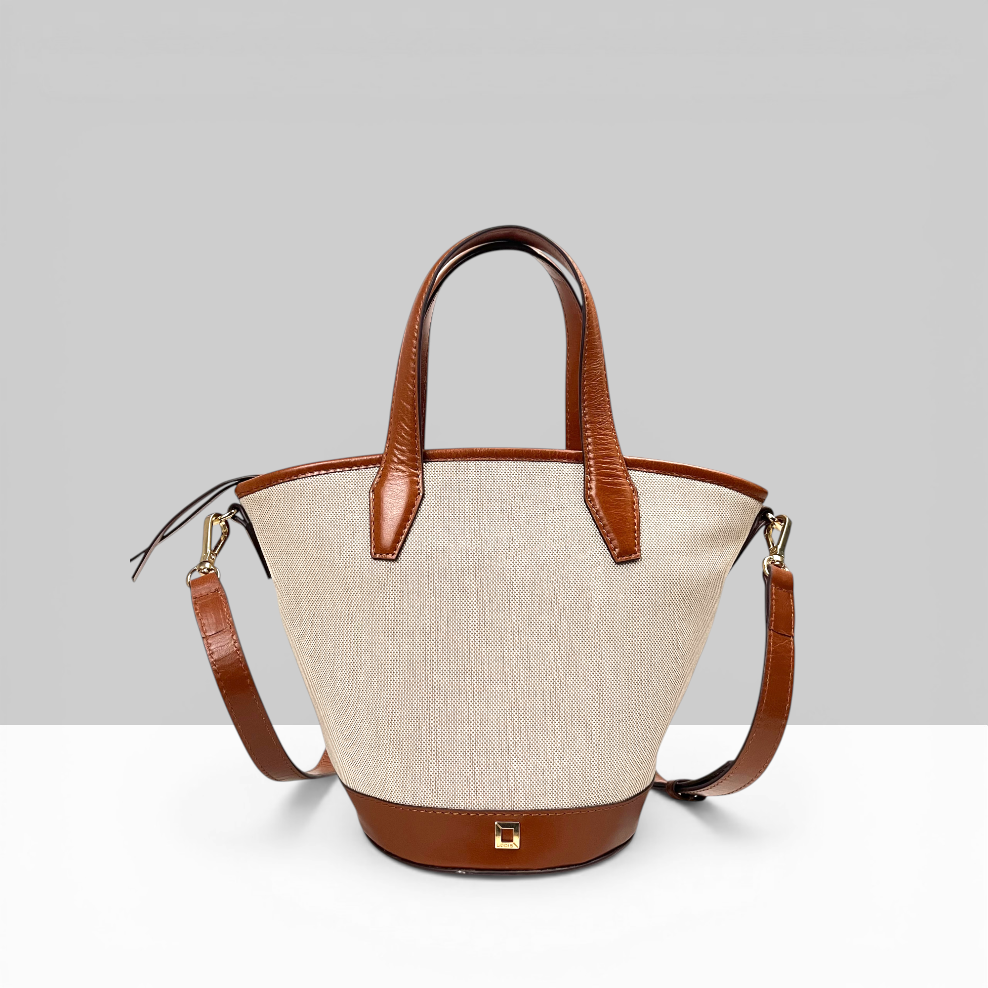 Lodis Kiara Small Bucket Bag in Chestnut – Front View, Blended Fabric Body with Chestnut Leather Trim, Handles and Adjustable Crossbody Strap | Lodis 1965