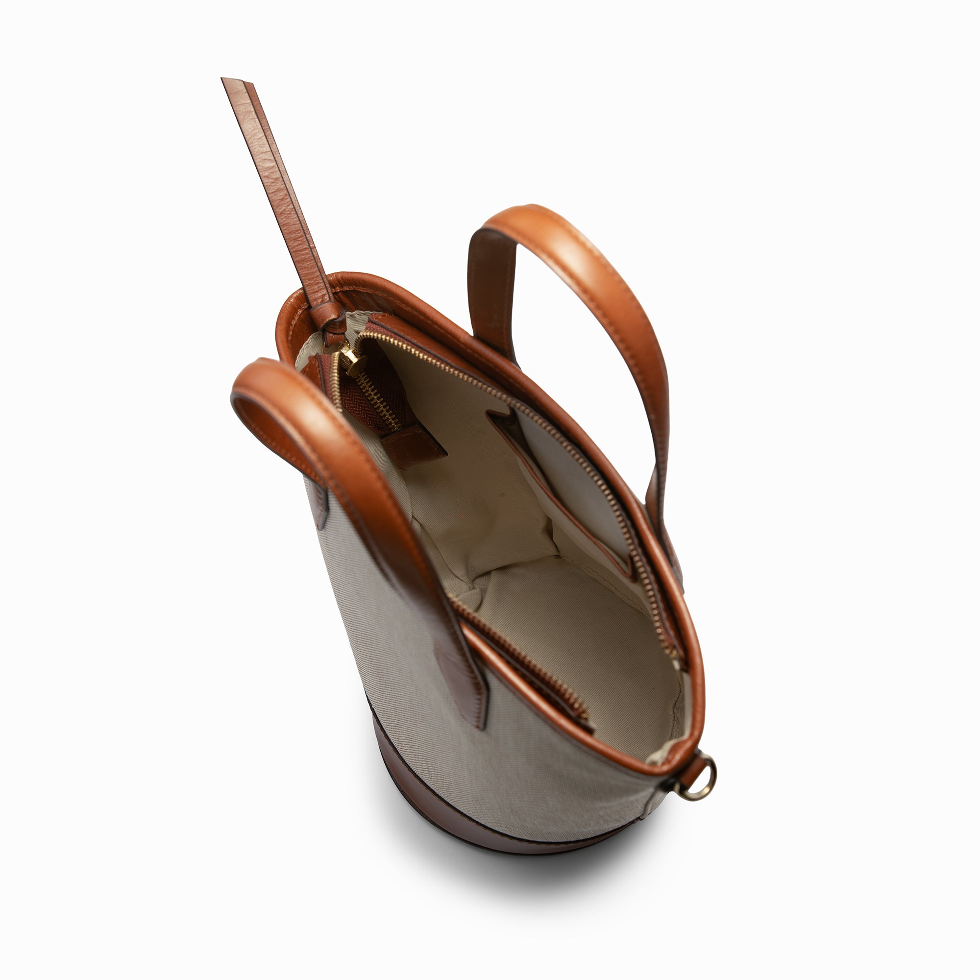 Lodis Kiara Small Bucket Bag in Chestnut – Interior View Open Showing Main Compartment, Interior Zip Pocket and Chestnut Leather Lining | Lodis 1965
