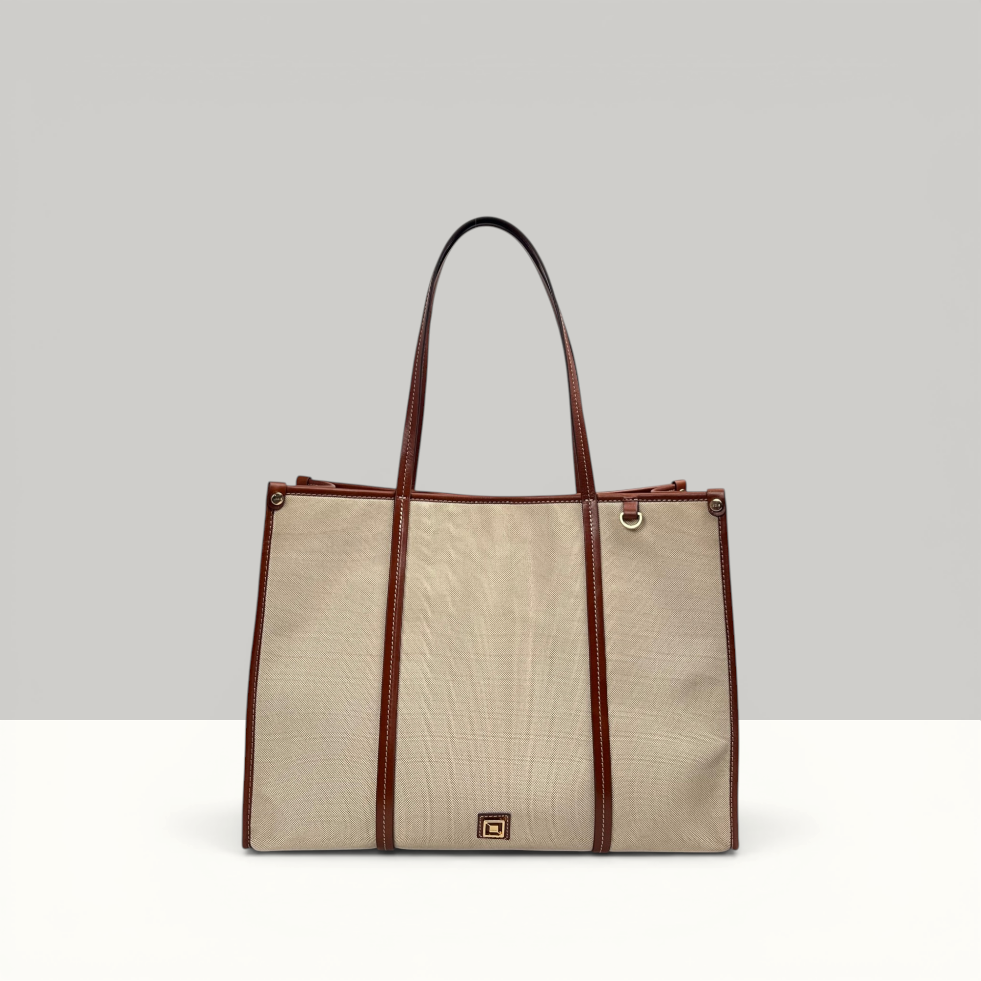 Lodis Kiara Tote in Chestnut – Front View, Blended Fabric Body with Chestnut Leather Trim, Handles and Logo Plate | Lodis 1965