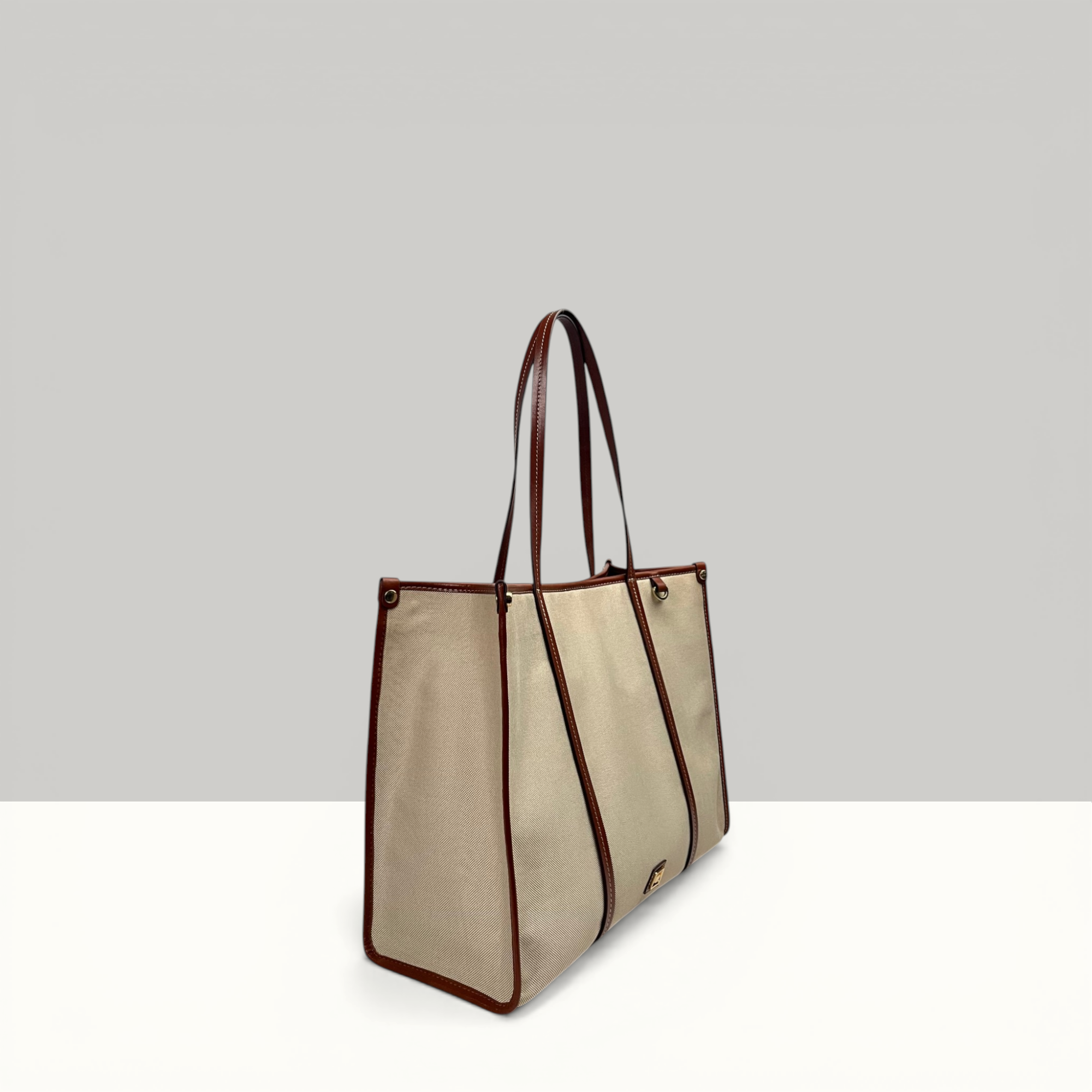 Lodis Kiara Tote in Chestnut – Three-Quarter View Showing Bag Depth, Structured Shape and Chestnut Leather Handles | Lodis 1965