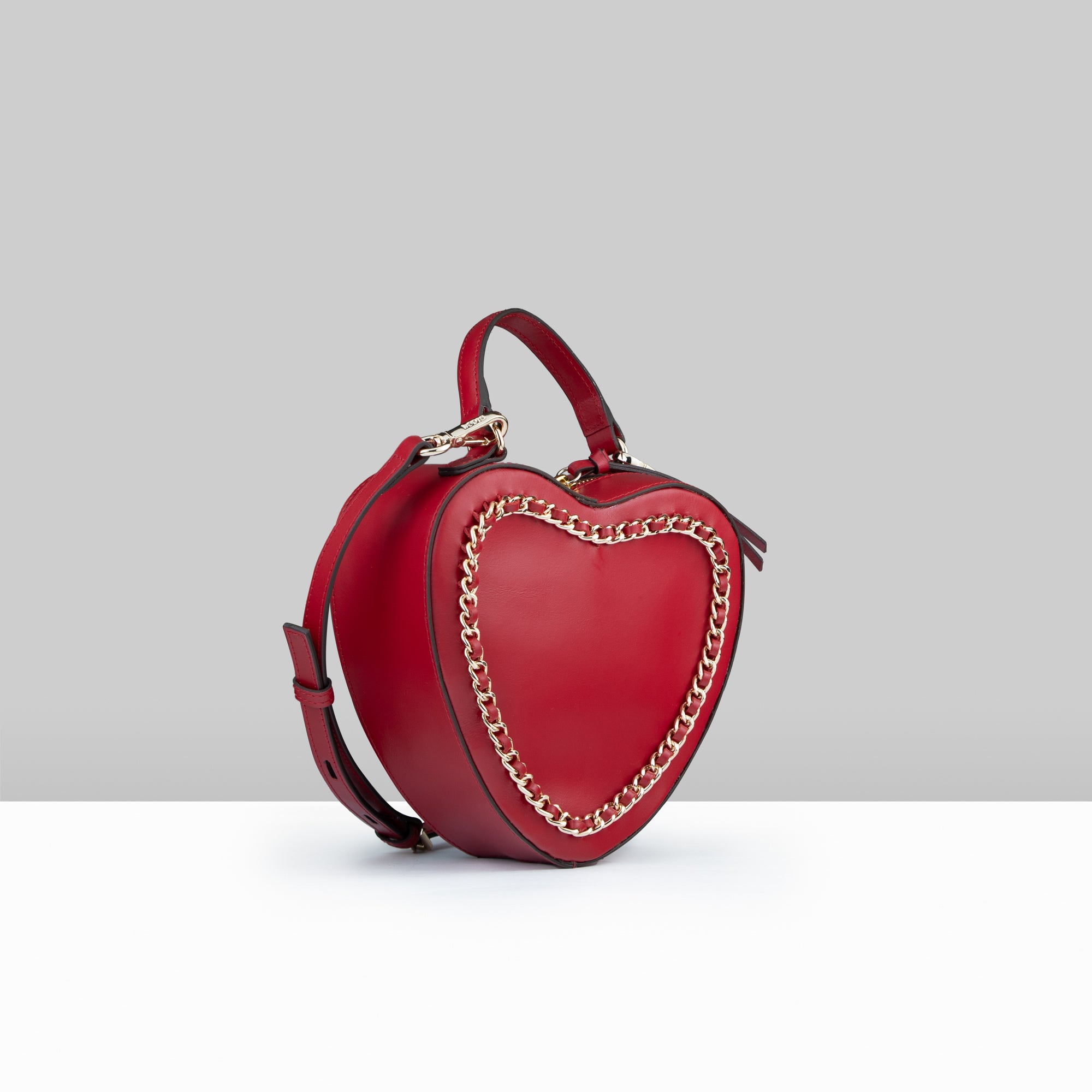 Lodis Love Crossbody Bag 2.0 in Rhythmic Red β Angled Front View, Heart-Shaped Premium Smooth Leather with Gold Metallic Chain Trim | Lodis 1965