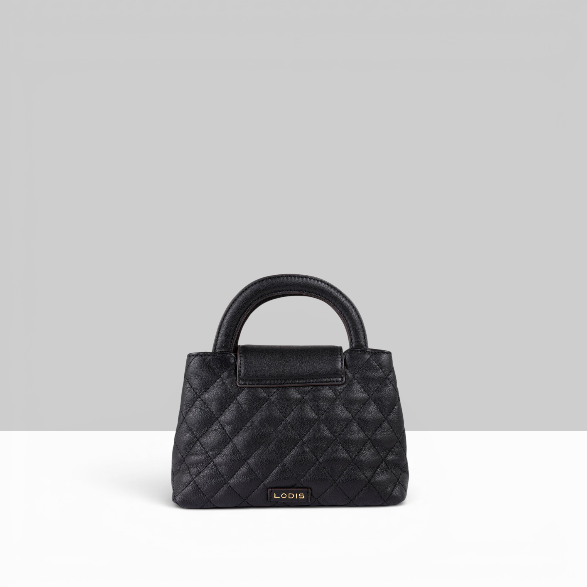 Lodis Mini Quilted Satchel in Black – Front View Highlighting Lodis Logo Plate on Diamond Quilted Pebbled Leather | Lodis 1965
