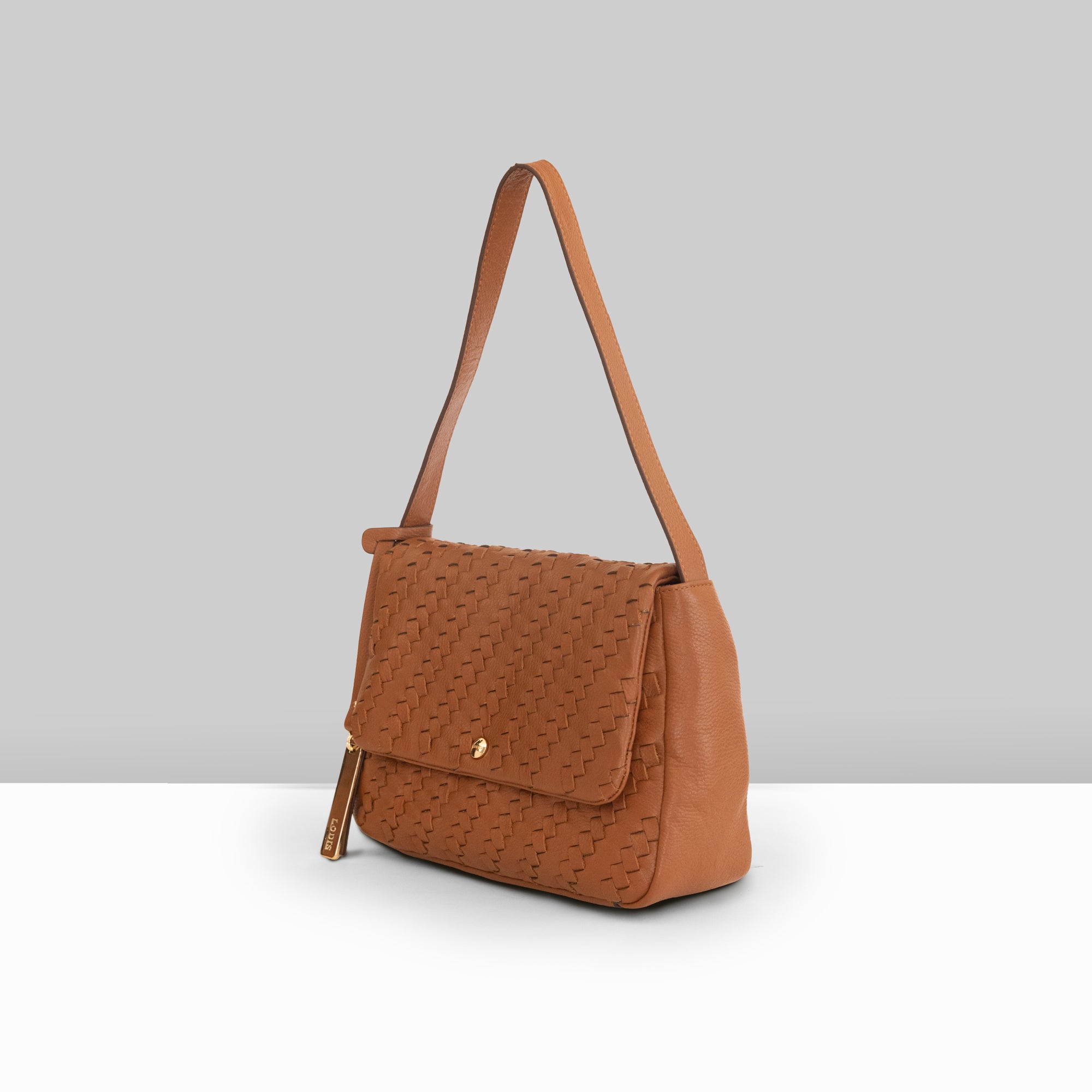 Lodis Solstice Shoulder Bag in Chestnut – Side Profile View, Woven Pebbled Leather with Flap Closure and Gold-Tone Snap Detail | Lodis 1965