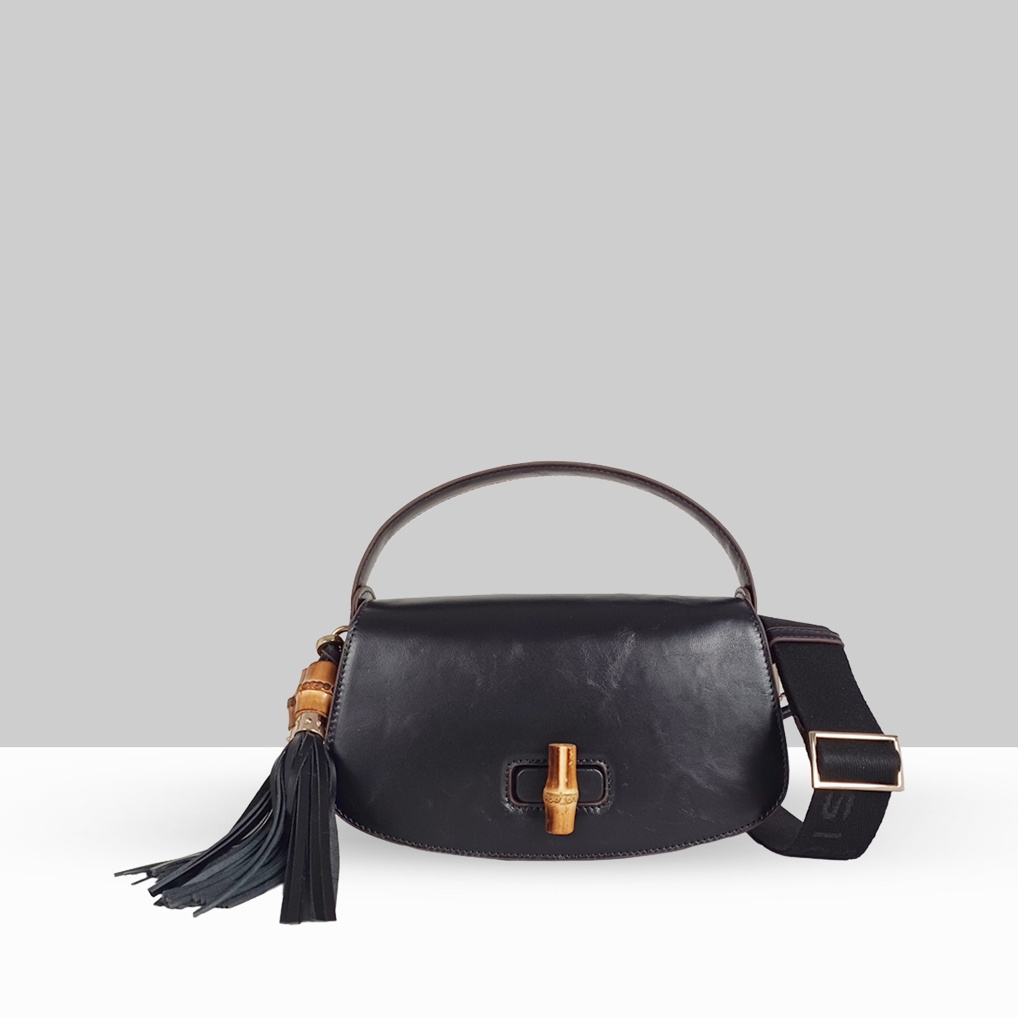Lodis Sondra Top Handle Crossbody Bag in Black – Front View, Drum Dyed Pebbled Leather with Bamboo Turn-Lock, Double Tassel, and Adjustable Woven Strap | Lodis 1965