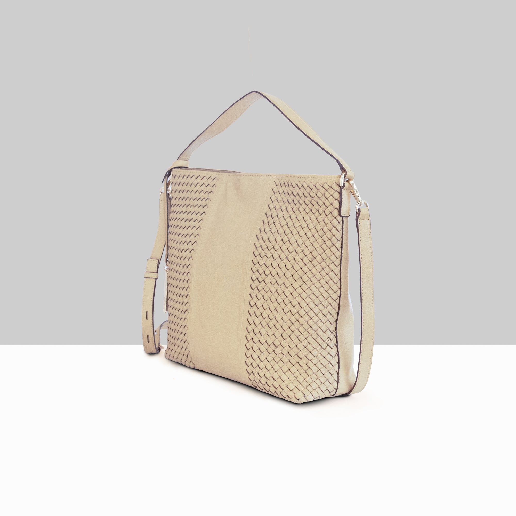 Lodis Venice Hobo in Sand – Angled Front View, Polished Woven Genuine Leather with Smooth Panel Detail and Adjustable Crossbody Strap | Lodis 1965
