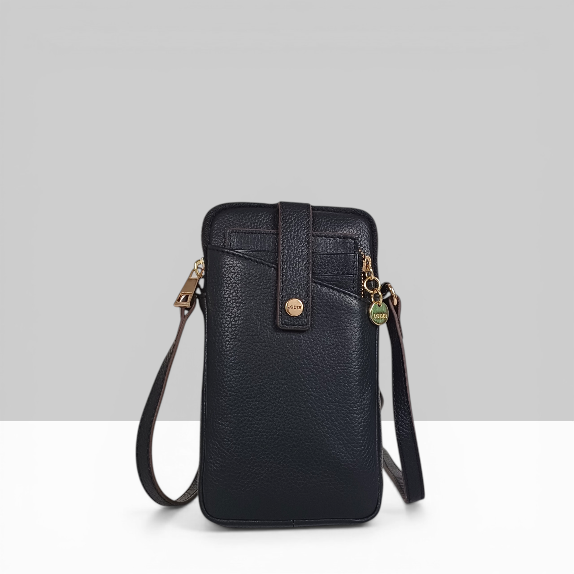 Lodis Catalina City Sling black pebbled leather crossbody phone bag with snap closure, front pocket, and gold hardware