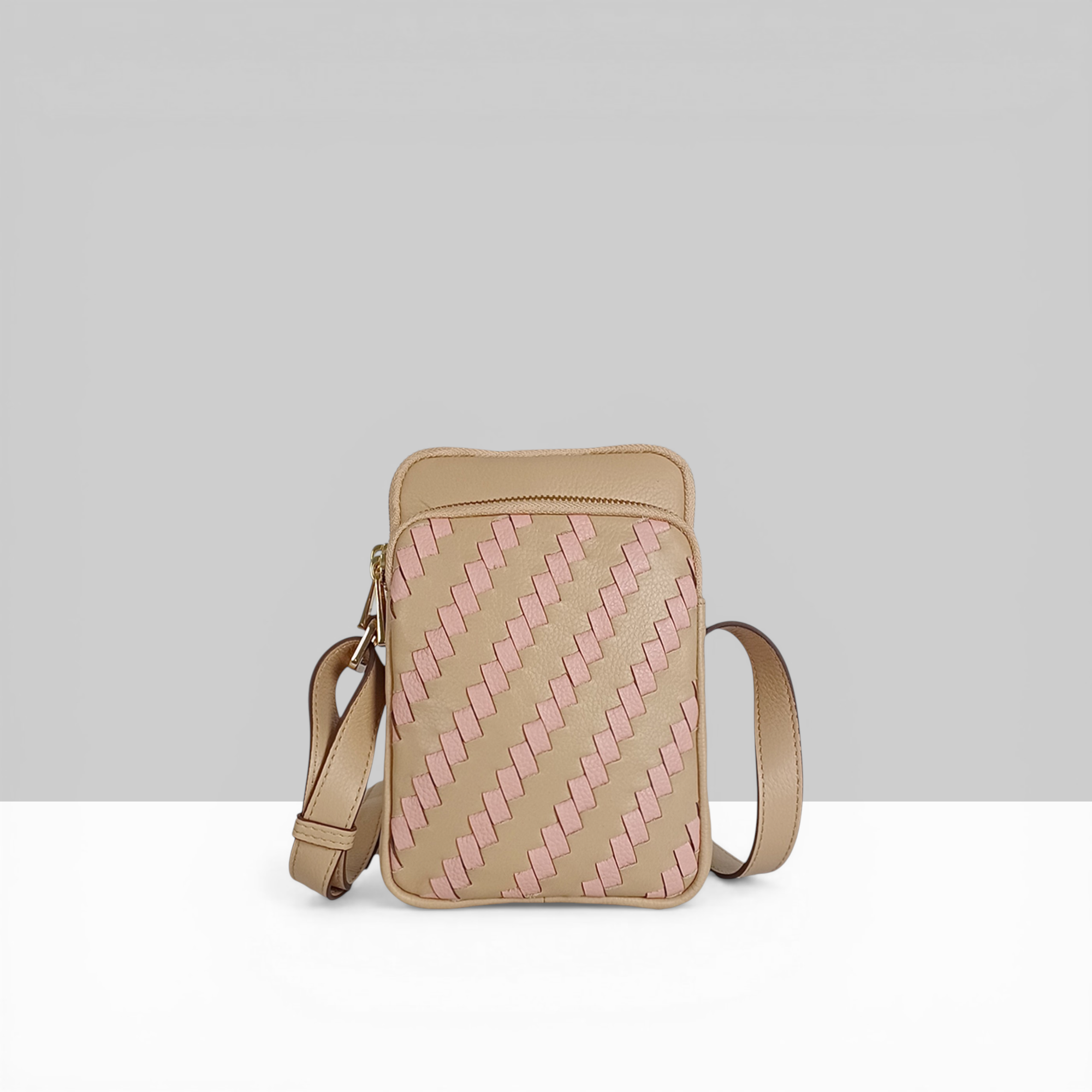 Lodis Solstice Phone Crossbody in Blush – Clean Front View Showing Woven Leather Pattern and Snap Closure Detail | Lodis 1965