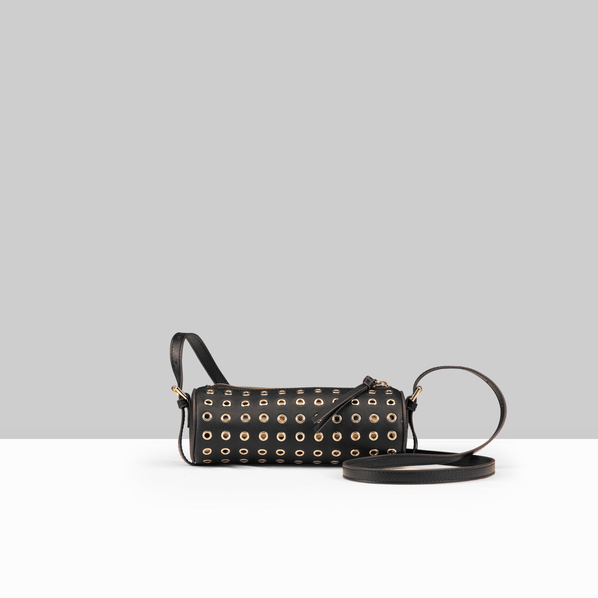 Stephanie Barrel Bag in Black Leather – Front View with Gold Eyelet Stud Detail and Detachable Crossbody Strap | Lodis 1965