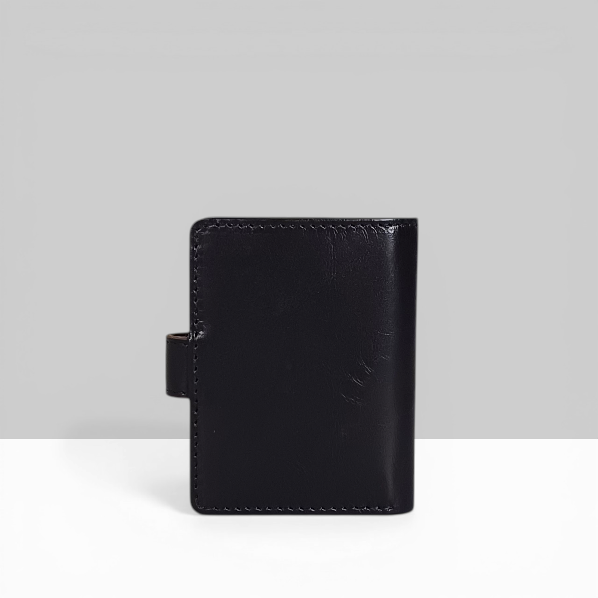 Lodis Overglow Slim Wallet in Black – Rear View Showing Smooth Leather Exterior