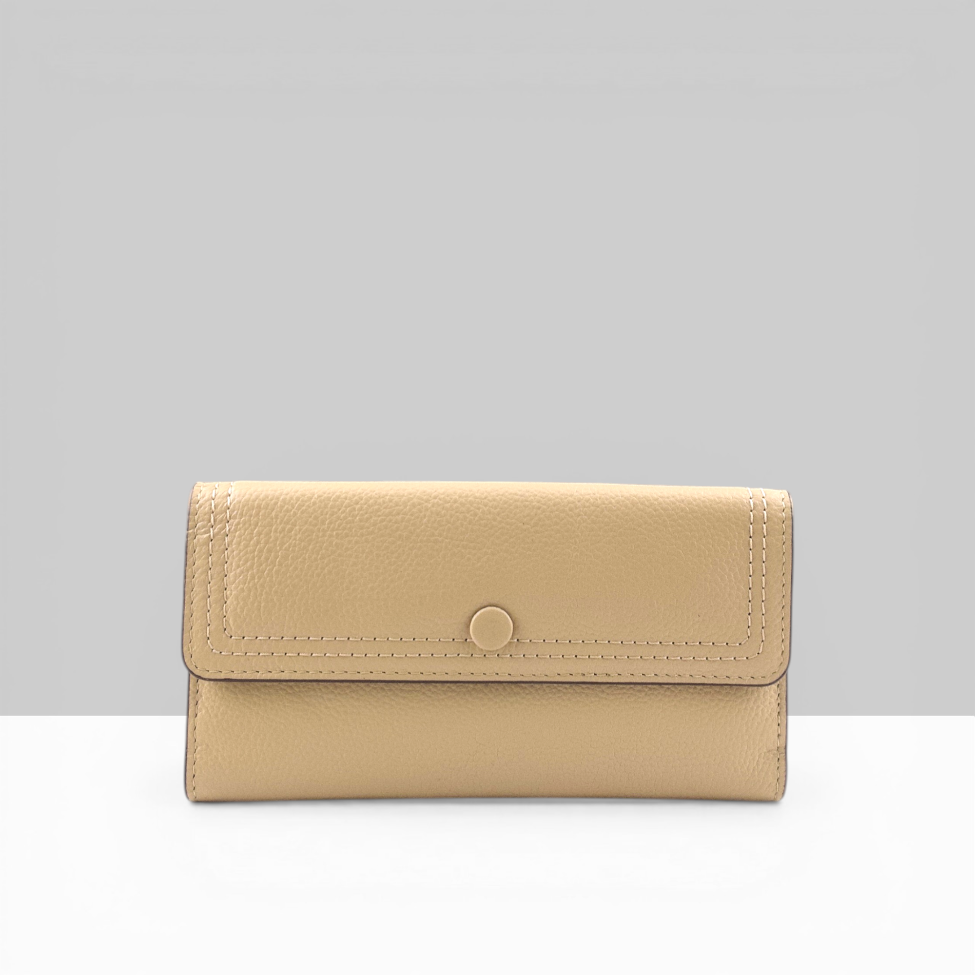 Lodis Kiara Large Flap Wallet in sand pebbled leather with snap closure – front view