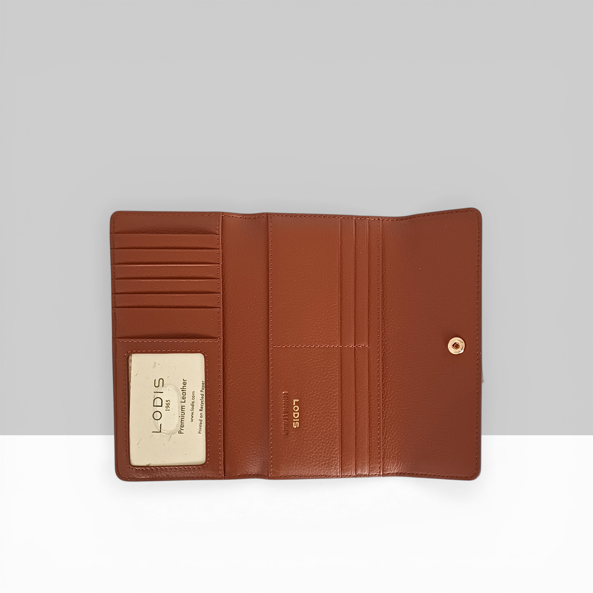 Lodis Kiara Large Flap Wallet in chestnut leather open view showing multiple card slots, bill compartments, and Lodis branded interior