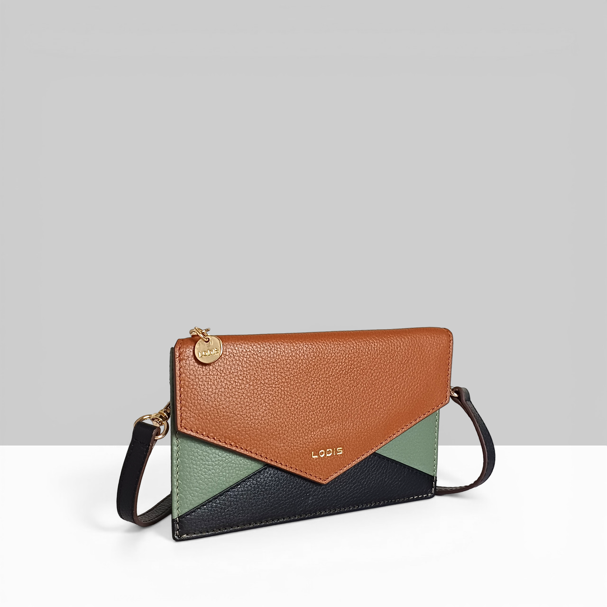 Lodis Vista Small Envelope Sling Bag – Cognac Pebbled Leather with Branded Logo