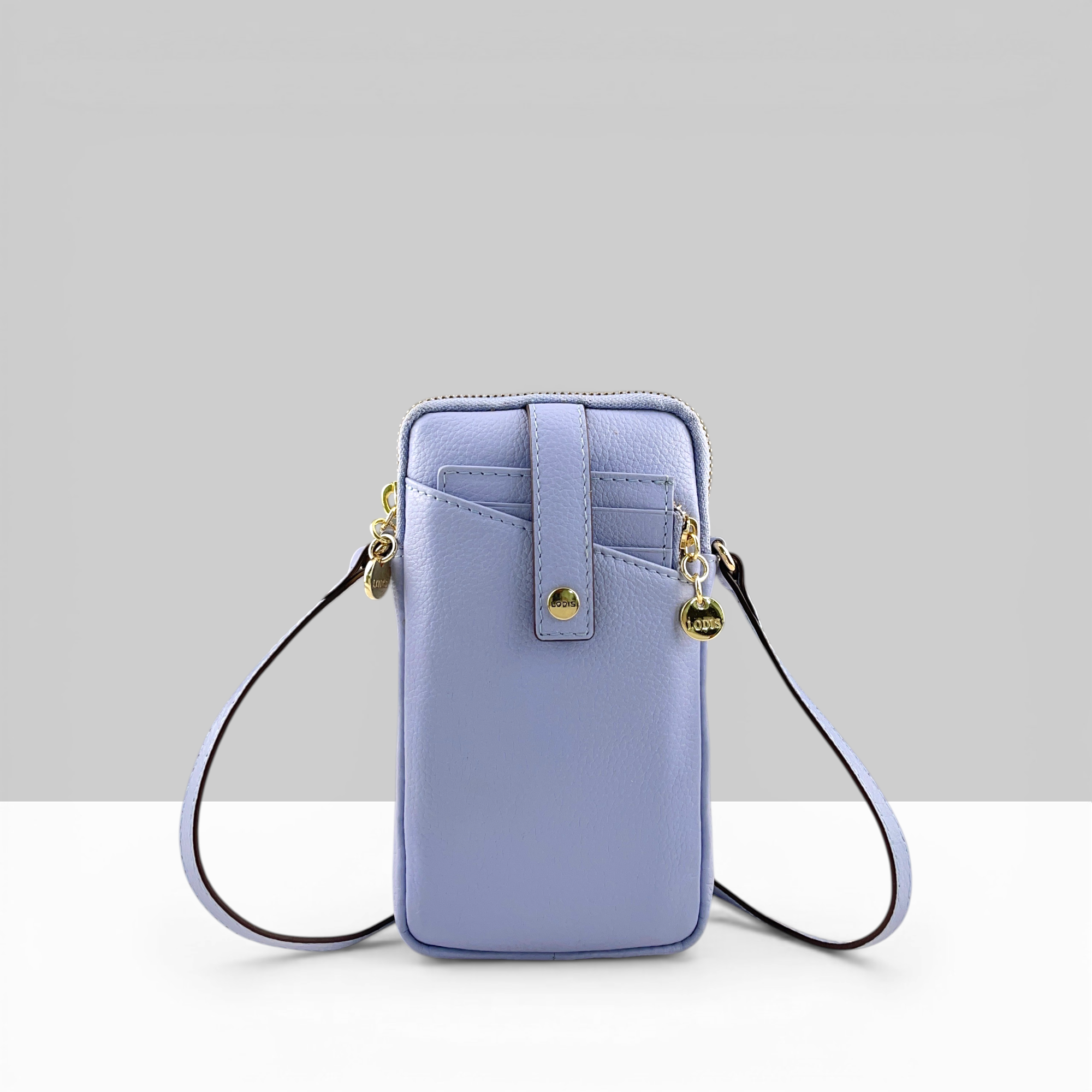 Lodis Catalina City Sling periwinkle blue pebbled leather crossbody phone bag with snap closure, front card pocket, and gold hardware