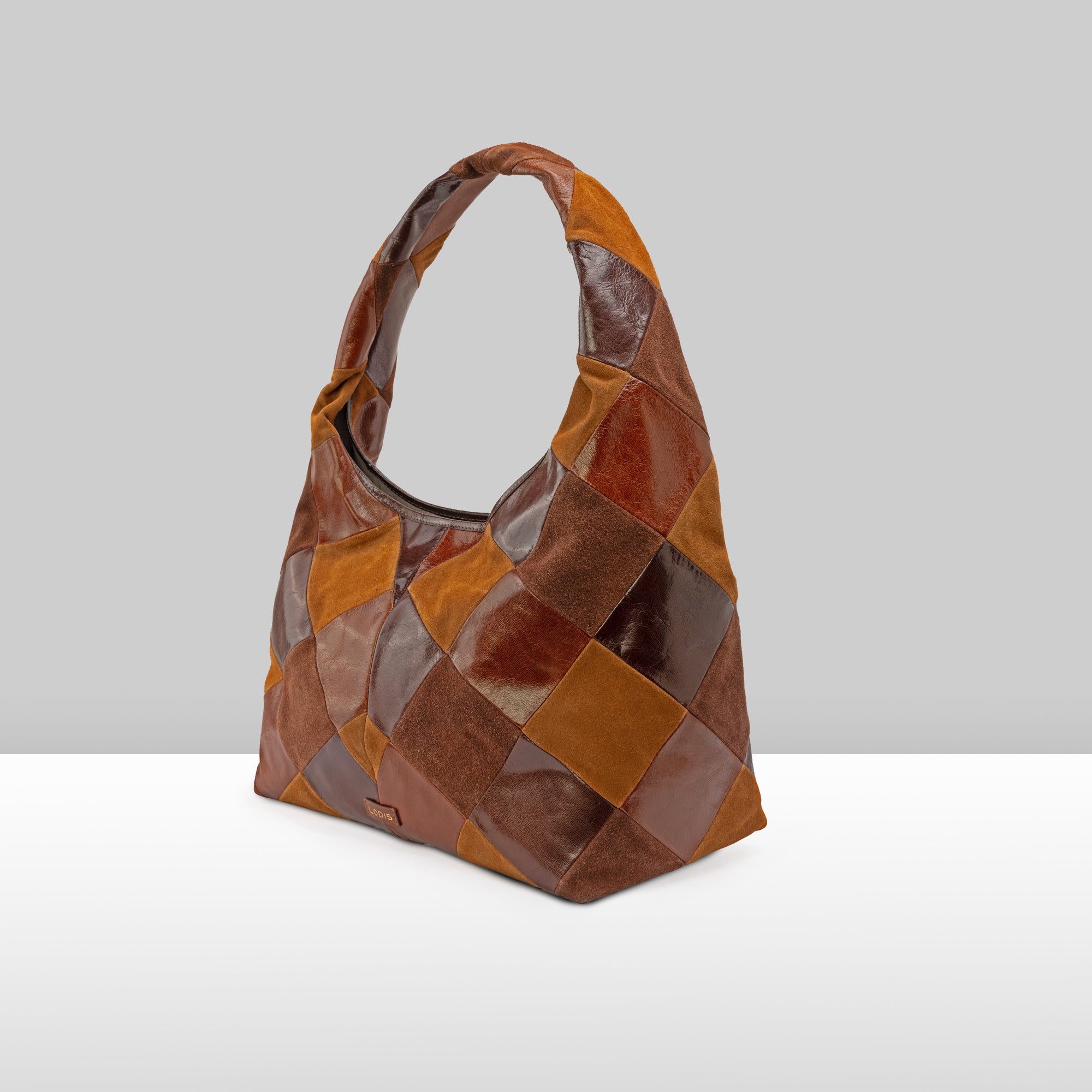Piece Train Hobo in Chestnut Multi Suede Leather – Side Profile View Highlighting Diamond Patchwork Texture and Structured Base | Lodis 1965