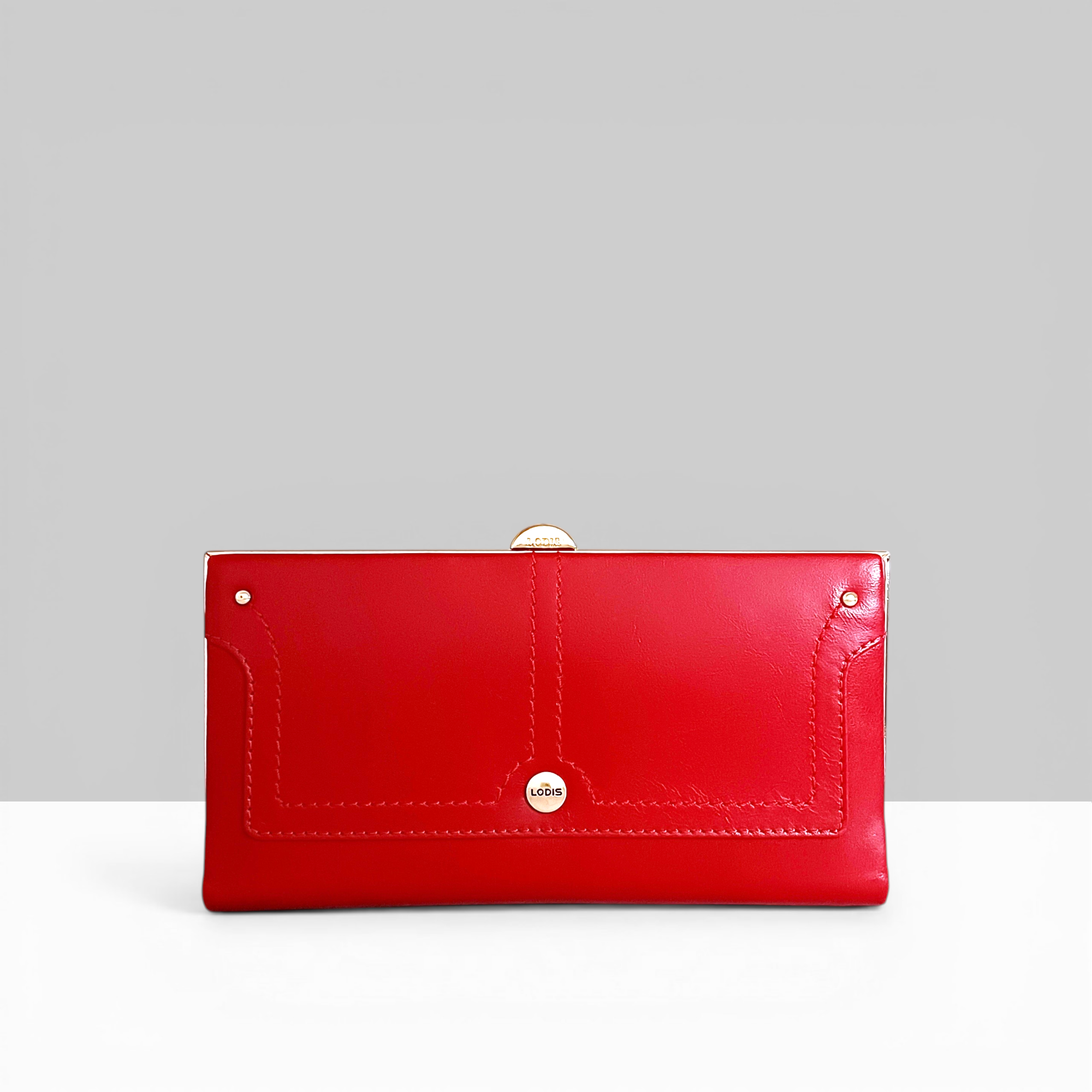 Overglow Clutch Frame Wallet in Rhythmic Red Patent Leather – Front View with Gold Frame Clasp and Lodis Logo Detail | Lodis 1965