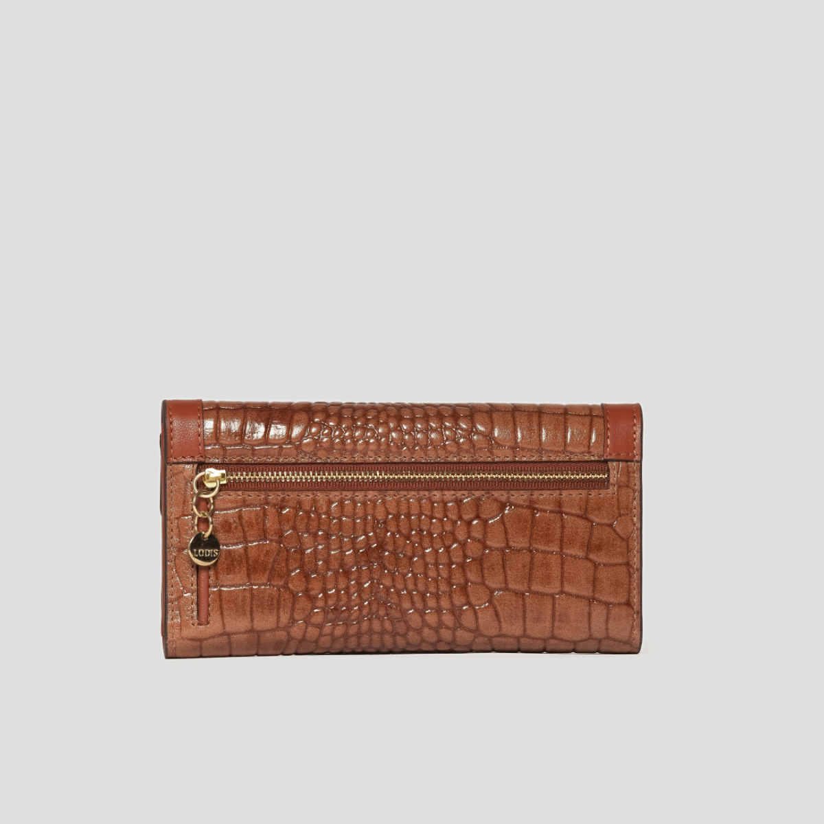 Lodis Amara Checkbook Clutch in Chestnut - Back View Showing Exterior Zip Pocket with Gold-Tone Zipper and Lodis Coin Charm on Glossy Croco-Embossed Leather | Lodis 1965