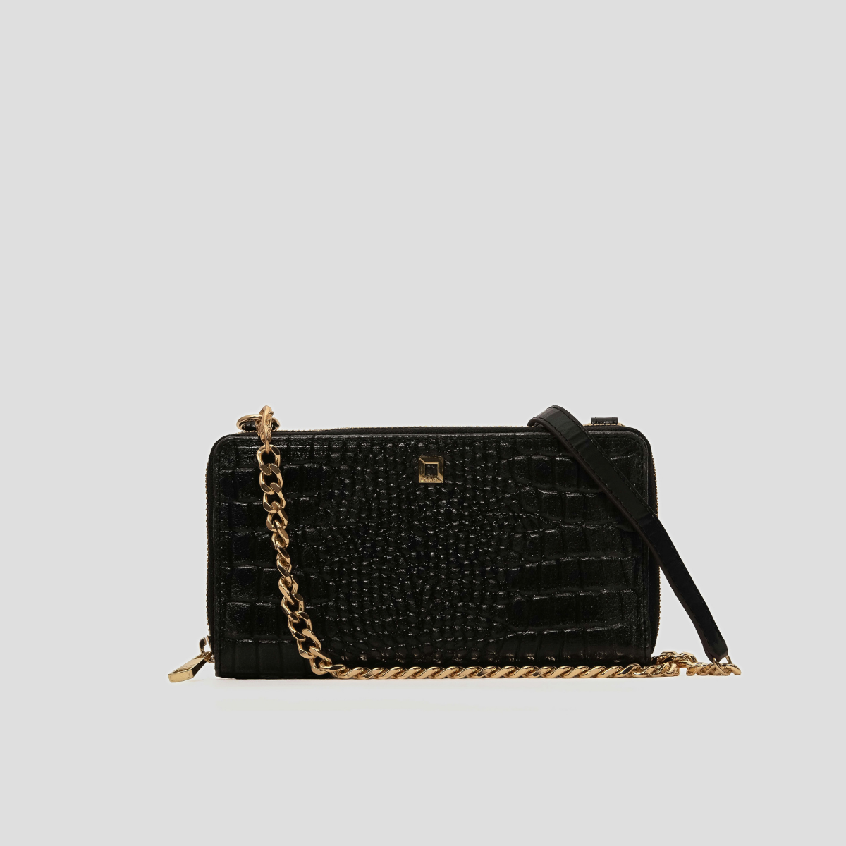 Lodis Amara Sling in Black - Front View, Black Glossy Croco-Embossed Leather Crossbody Bag with Gold-Tone Chain Strap, Leather Shoulder Strap and Square Logo Plate | Lodis 1965