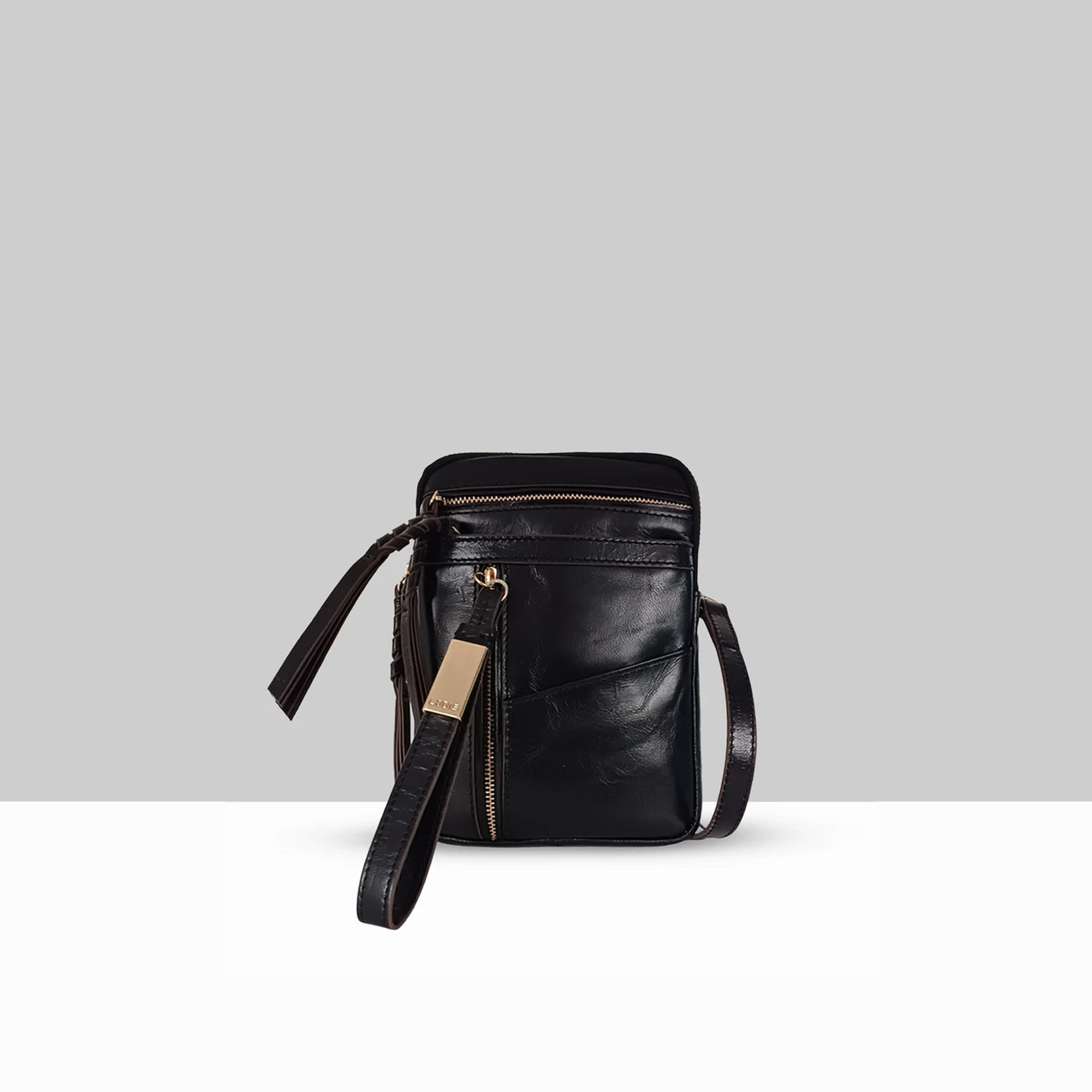 Lodis Catalina 2.0 Phone Crossbody in Black – Front View, Smooth Cow-Hide Leather with Zip Top, Front Zip Pocket, Gold-Tone Logo Plate, and Tassel Accent | Lodis 1965