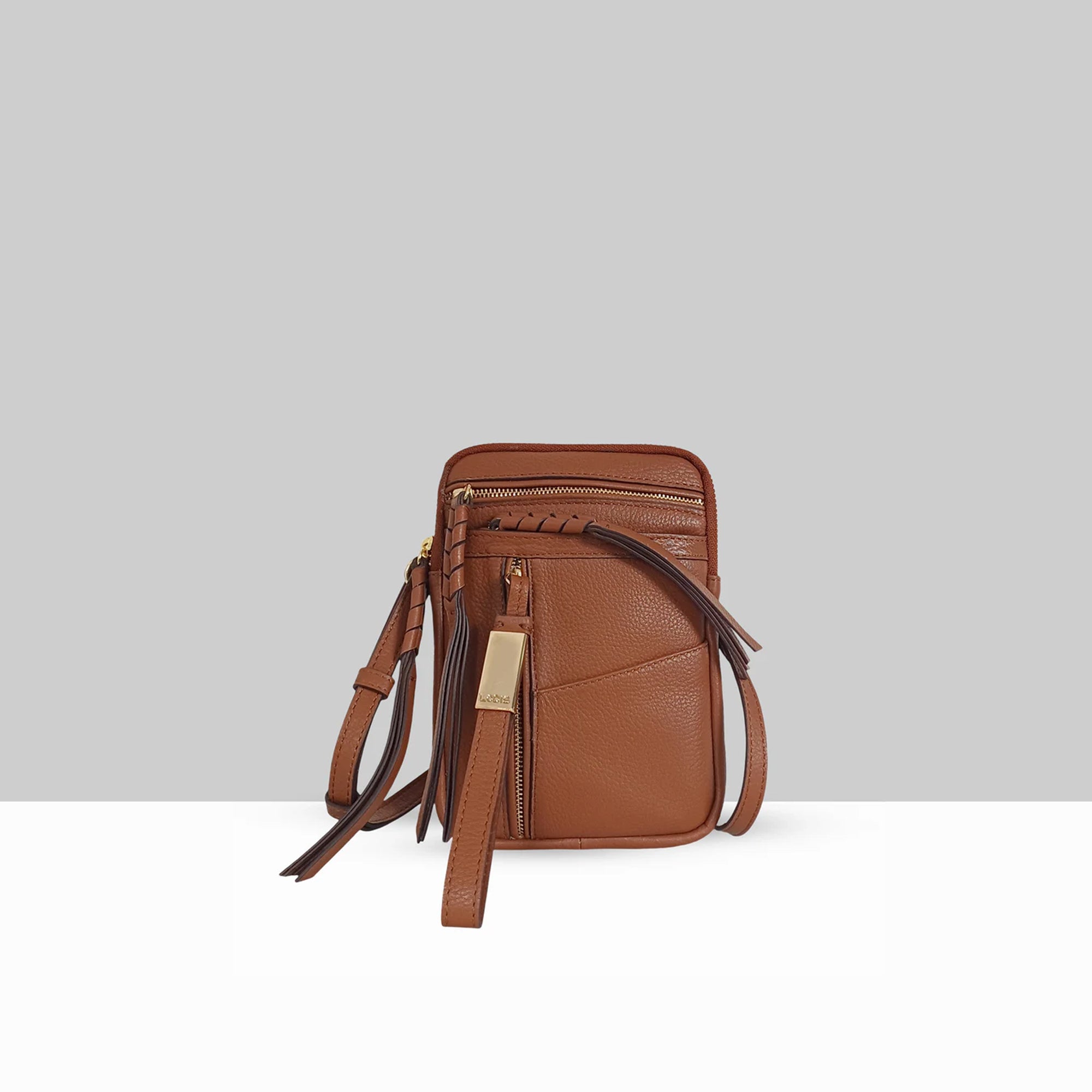 Lodis Catalina 2.0 Phone Crossbody in Chestnut – Front View, Smooth Cow-Hide Leather with Zip Top, Front Zip Pocket, Whipstitch Detail, and Multi-Tassel Accent | Lodis 1965