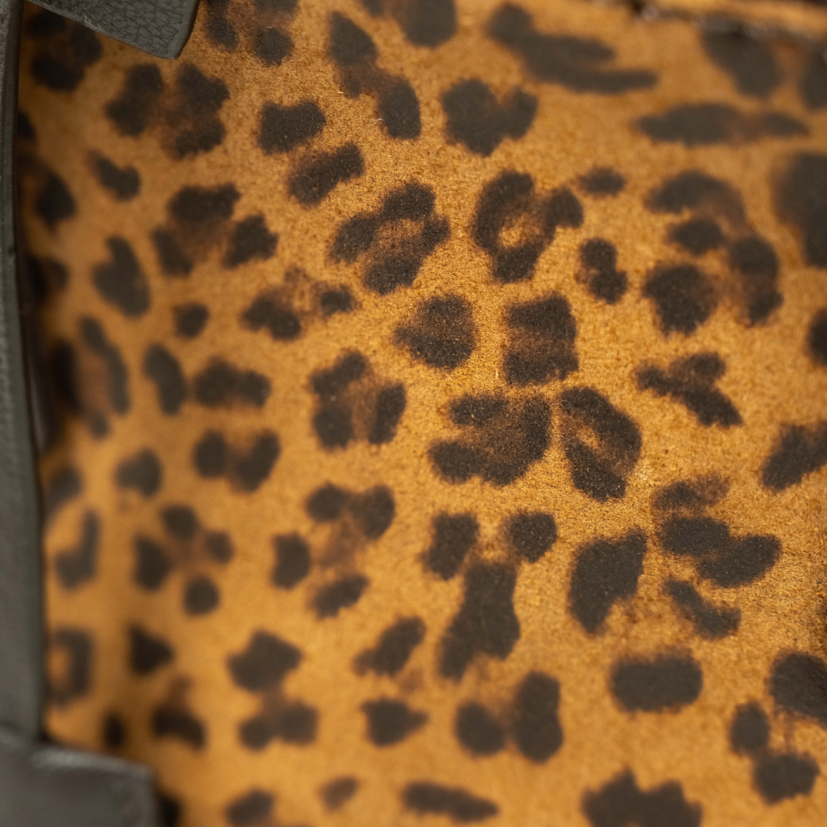 Lodis Eclipse Top Handle Crossbody in Orange Cheetah Print - Macro Texture Detail of Orange Cheetah Printed Suede | Lodis 1965