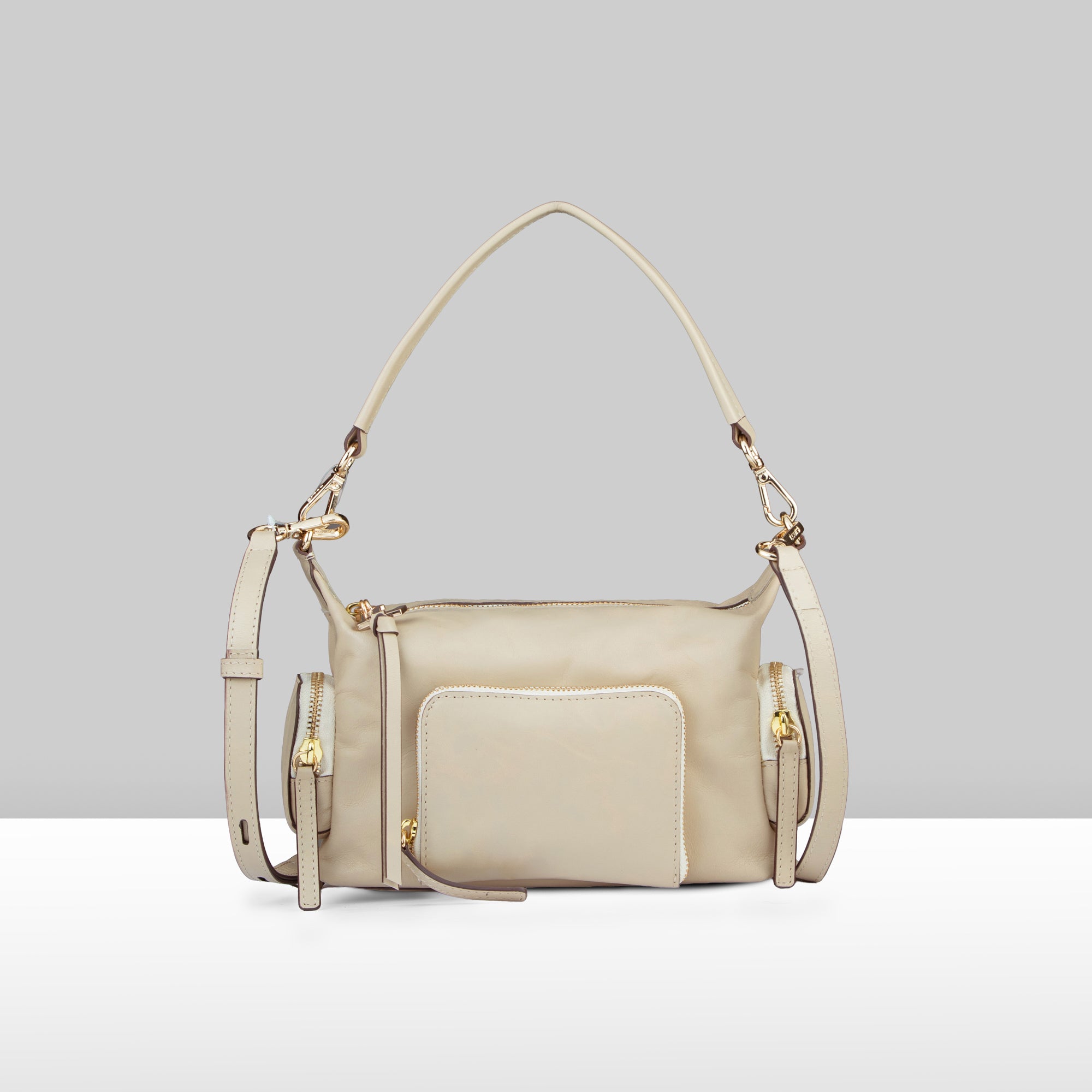 Lodis Jill TH Crossbody in Sand – Front View, Polished Genuine Leather with Front Zip Pocket and Gold-Tone Hardware | Lodis 1965