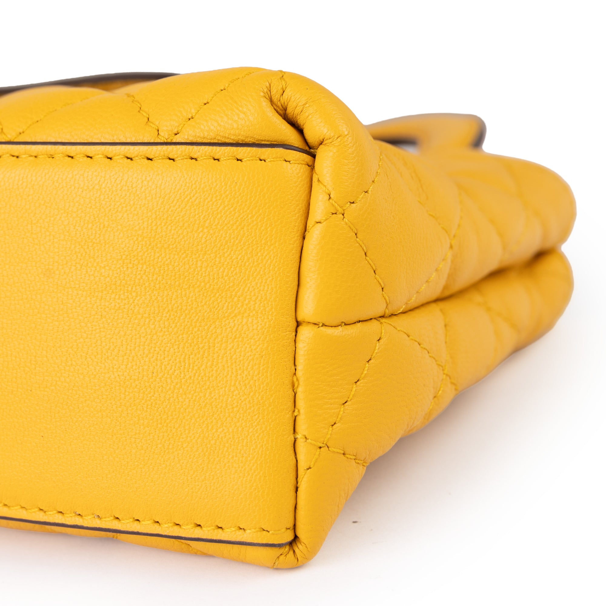 Lodis Mini Quilted Satchel in Curry – Close-Up of Diamond Quilted Pebbled Leather Texture and Stitching Detail | Lodis 1965