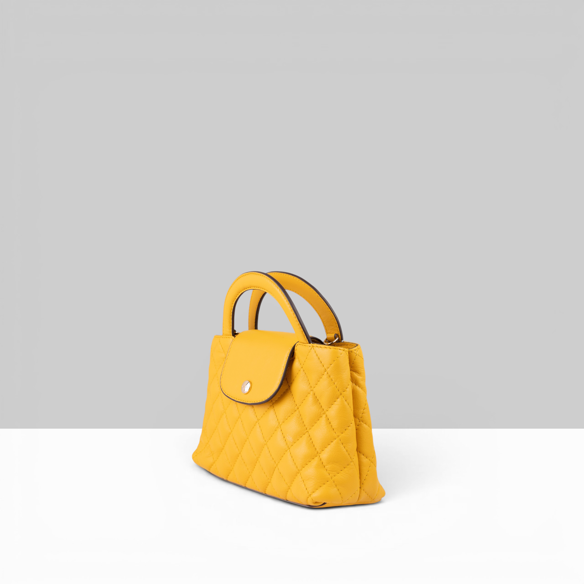 Lodis Mini Quilted Satchel in Curry – Side Profile View Showing Bag Depth and Top Handle | Lodis 1965