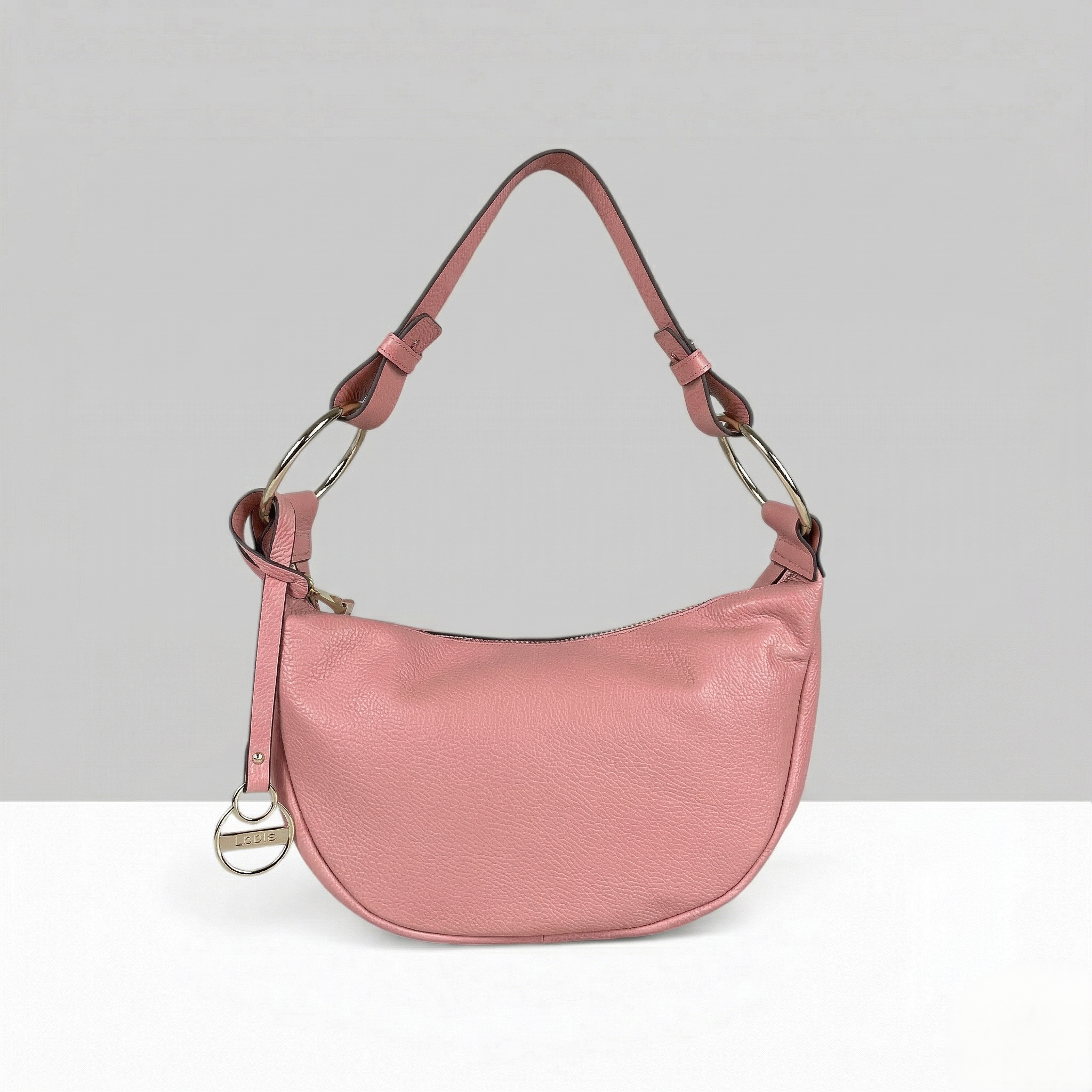 Lodis Solaris Hobo Bag in Ballet Pink – Front View, Drum Dyed Pebbled Leather Crescent Silhouette with Zip Closure, Gold-Tone D-Ring Hardware, and Logo Coin Charm | Lodis 1965