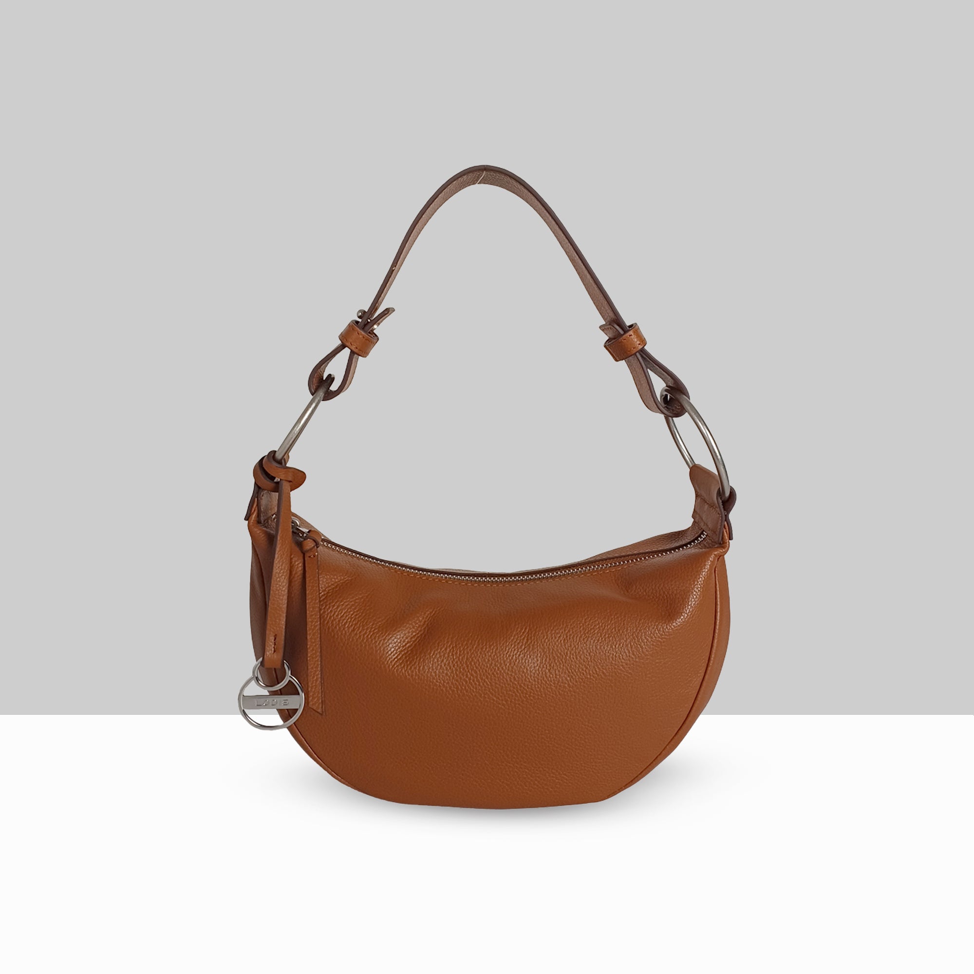 Lodis Solaris Hobo Bag in Chestnut – Front View, Drum Dyed Pebbled Leather Crescent Silhouette with Zip Closure, Gold-Tone D-Ring Hardware, and Knotted Shoulder Strap | Lodis 1965
